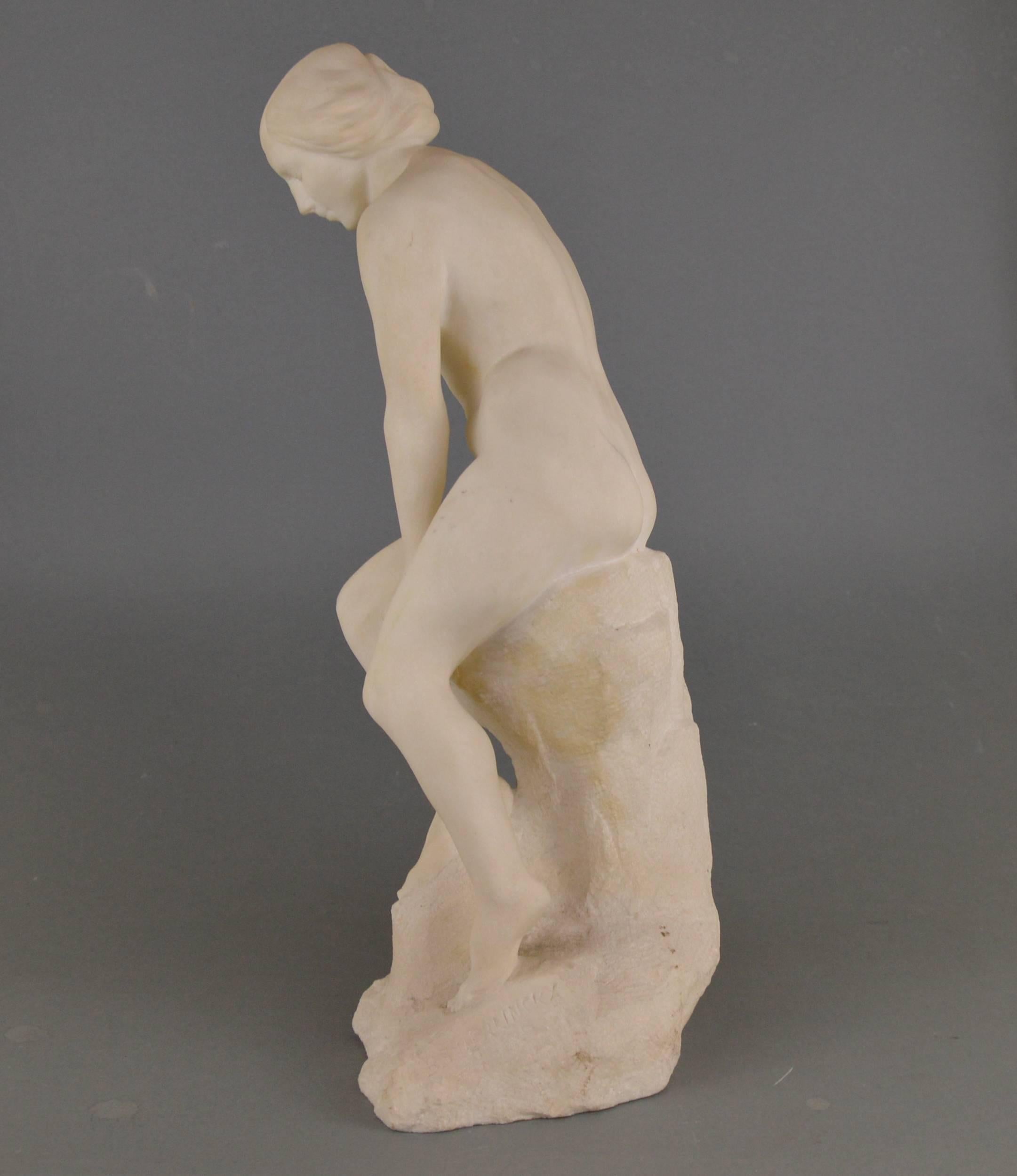 Beaudouin Tuerlinckx (1873-1945) Carrara marble sculpture, nue woman sitting on a rock.
Measures: Height 41 cm.
  