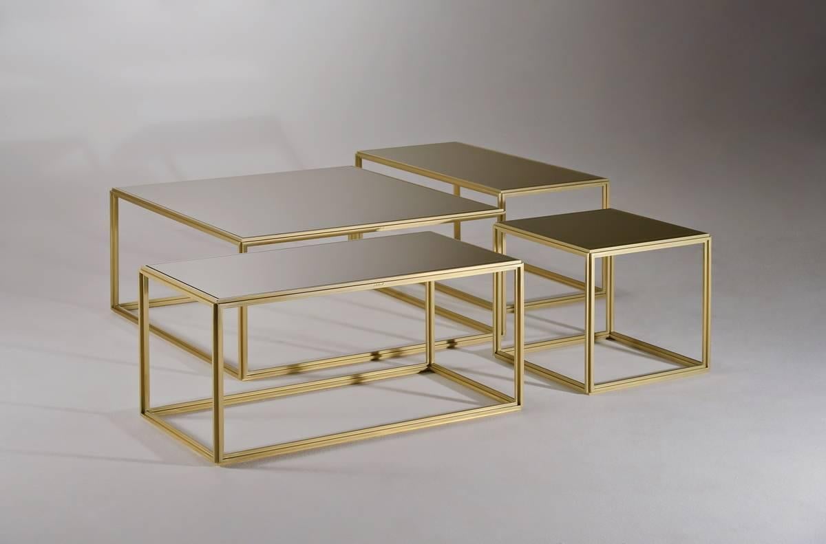 Available to order
We created this collection for a New York client who opted for a 'Gold on Gold' look, combining natural brass with mustard tempered glass tops. We found the result very sleek indeed. Placed together they form a perfect square