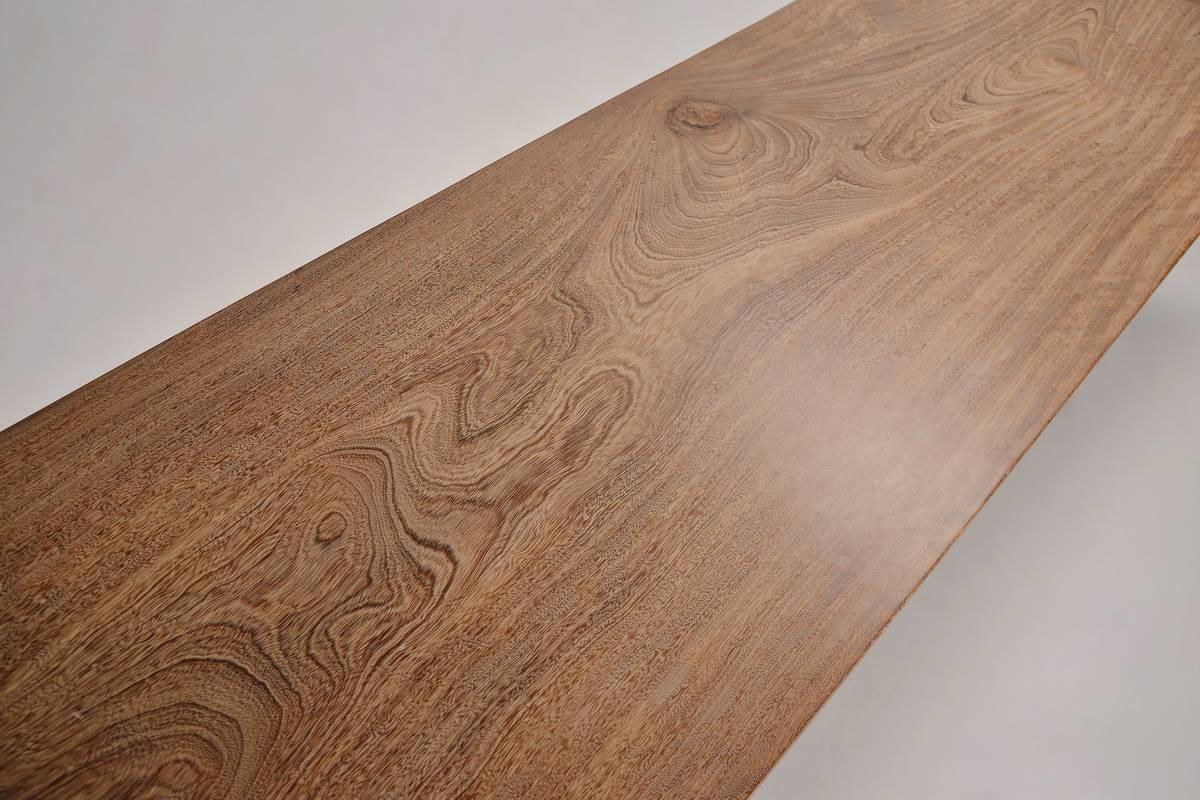 Available for your order.

We created this table for a client in Phuket, Thailand. He choose this particular slab of antique Chickenwing from our collection. This wood had an amazing 'grain' or 'pattern', the chines call this wood Chickenwing wood
