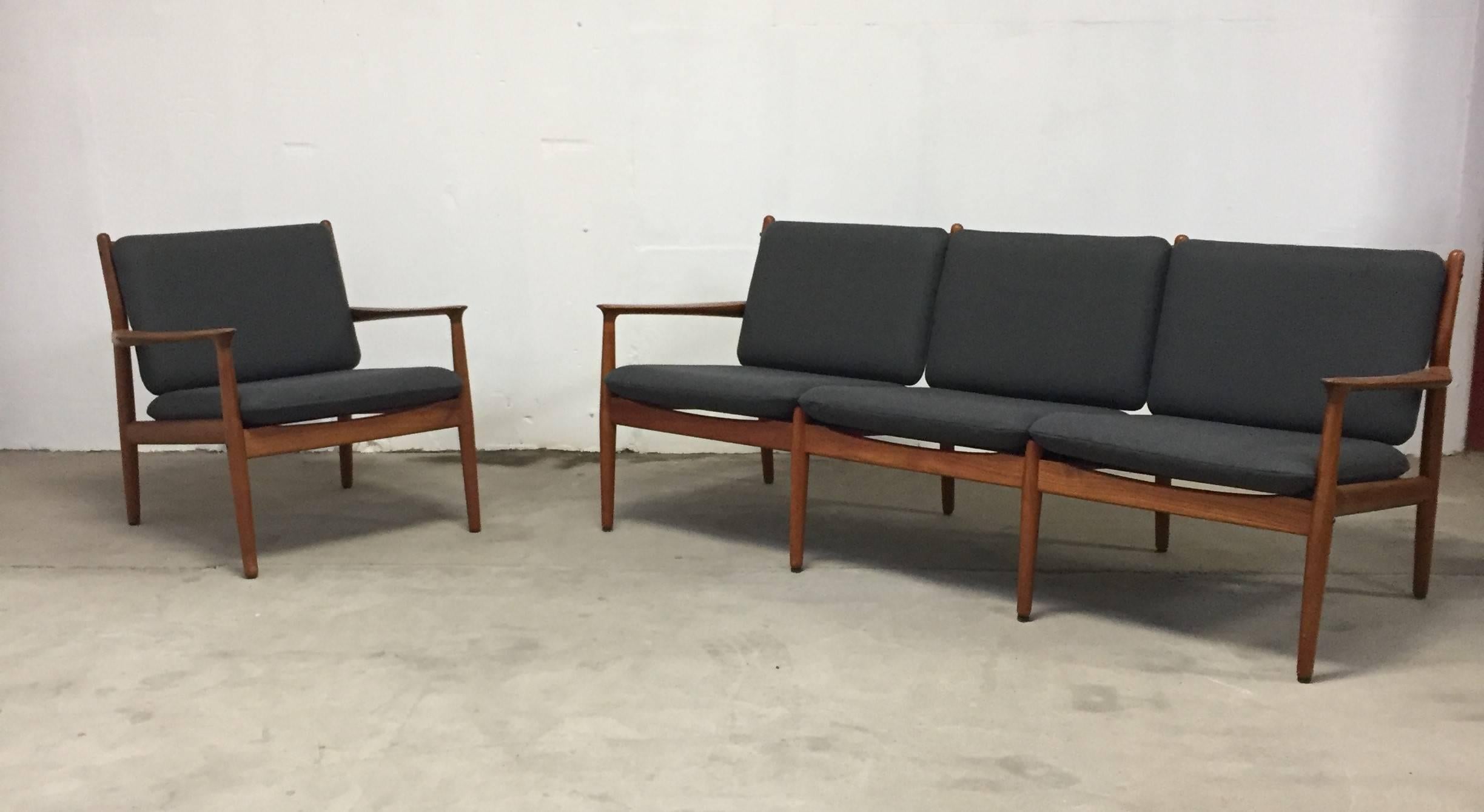 Beautiful Danish modern lounge sofa designed by Grete Jalk for Glostrup Møbelfabrik in the 1960s.

The typical clear, light and elegant lines in the design from Grete Jalk. 

Solid teak frames and both are reupholstered with grey whool. 
The