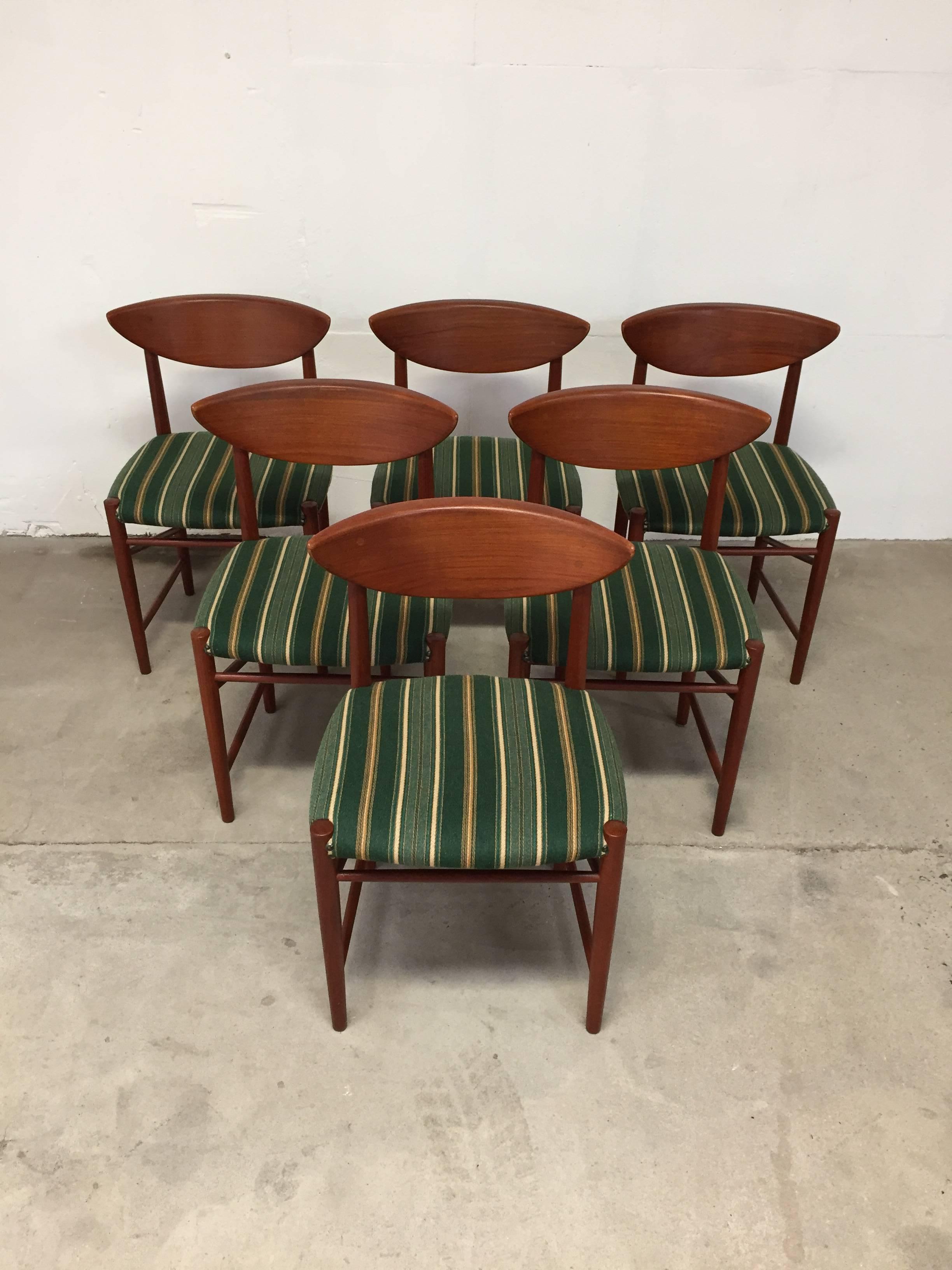 A beautiful set of teak dining chairs model 316 by Peter Hvidt and Orla Mølgaard Nielsen for Søborg Mobelfabrik. 

Classic and beautiful side profiles with detailed lower leg crossbars, displaying the finest craftsmanship and design the