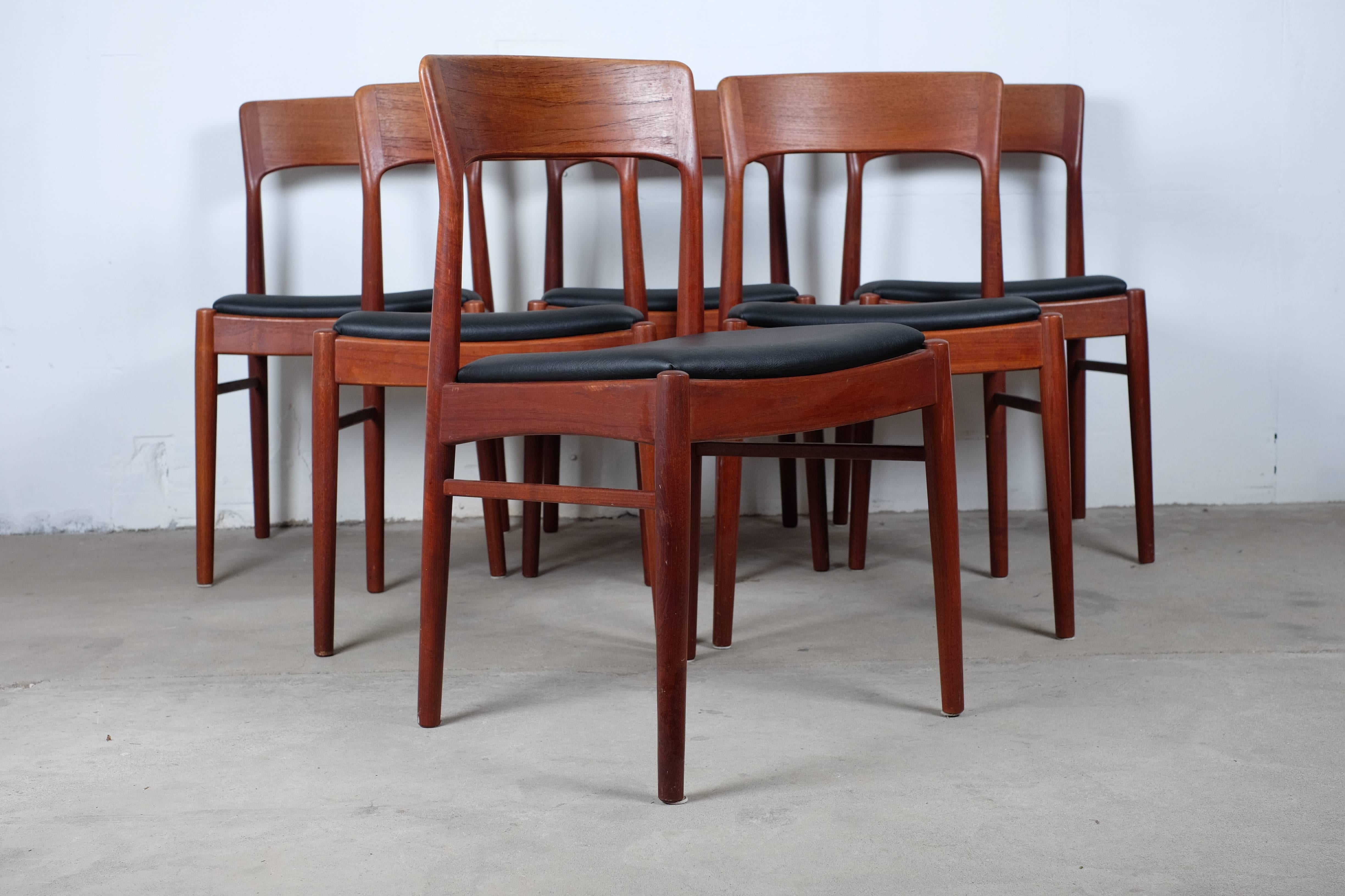 Craftsmanship throughout featuring a solid rosewood frame with a sculpted backrest and new-upholstered with real leather on the seats. 

This is a very comfortable dining chair - with tons of Danish Mid-Century Modern era character.

The chairs