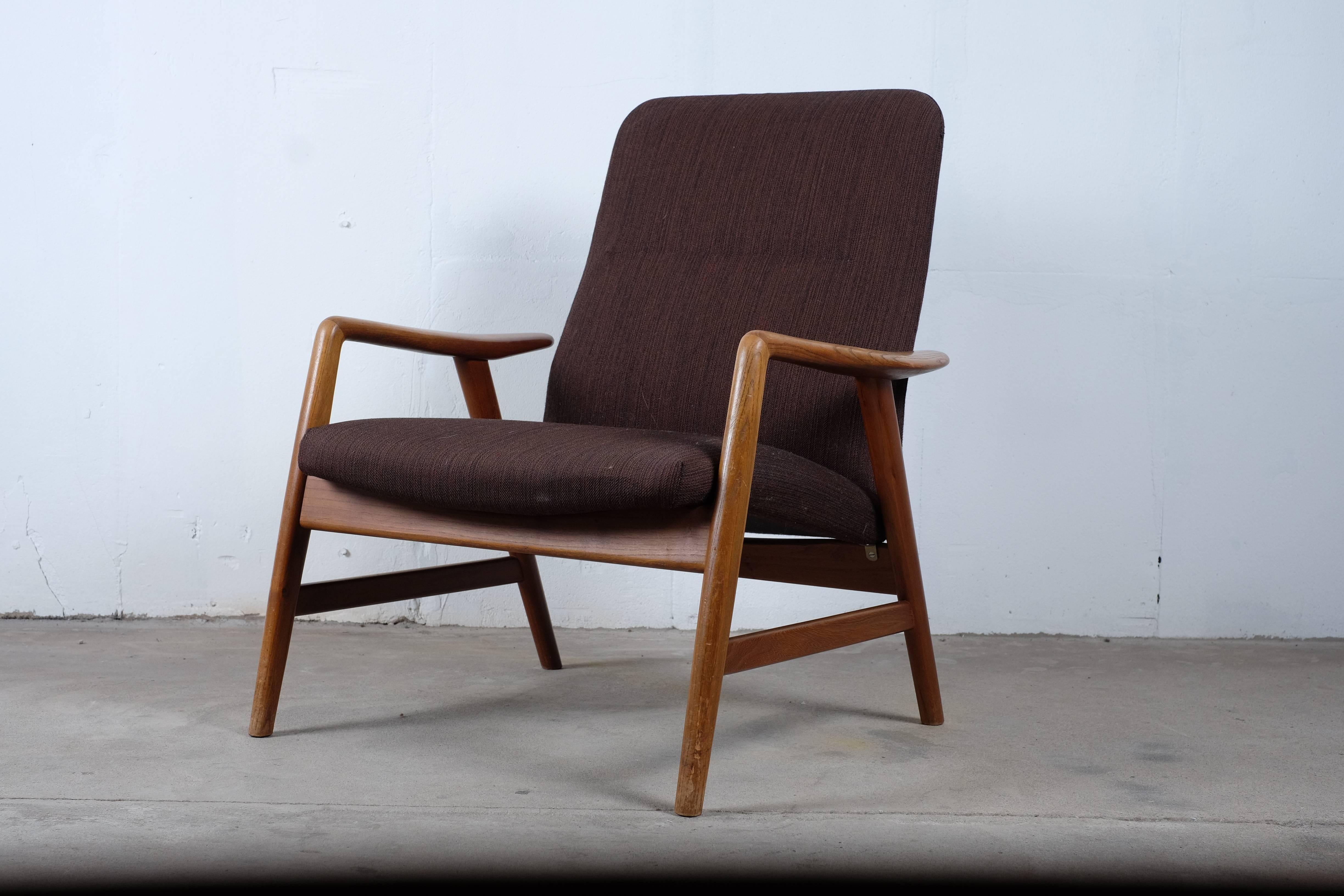 This stunning Danish modern low back lounge chair was designed by Alf Svensson for Fritz Hansen in 1957. 

The frame features beautifully sculpted teak arms and spindle legs. The reclined backrest allows you to sit comfortable in the chair for