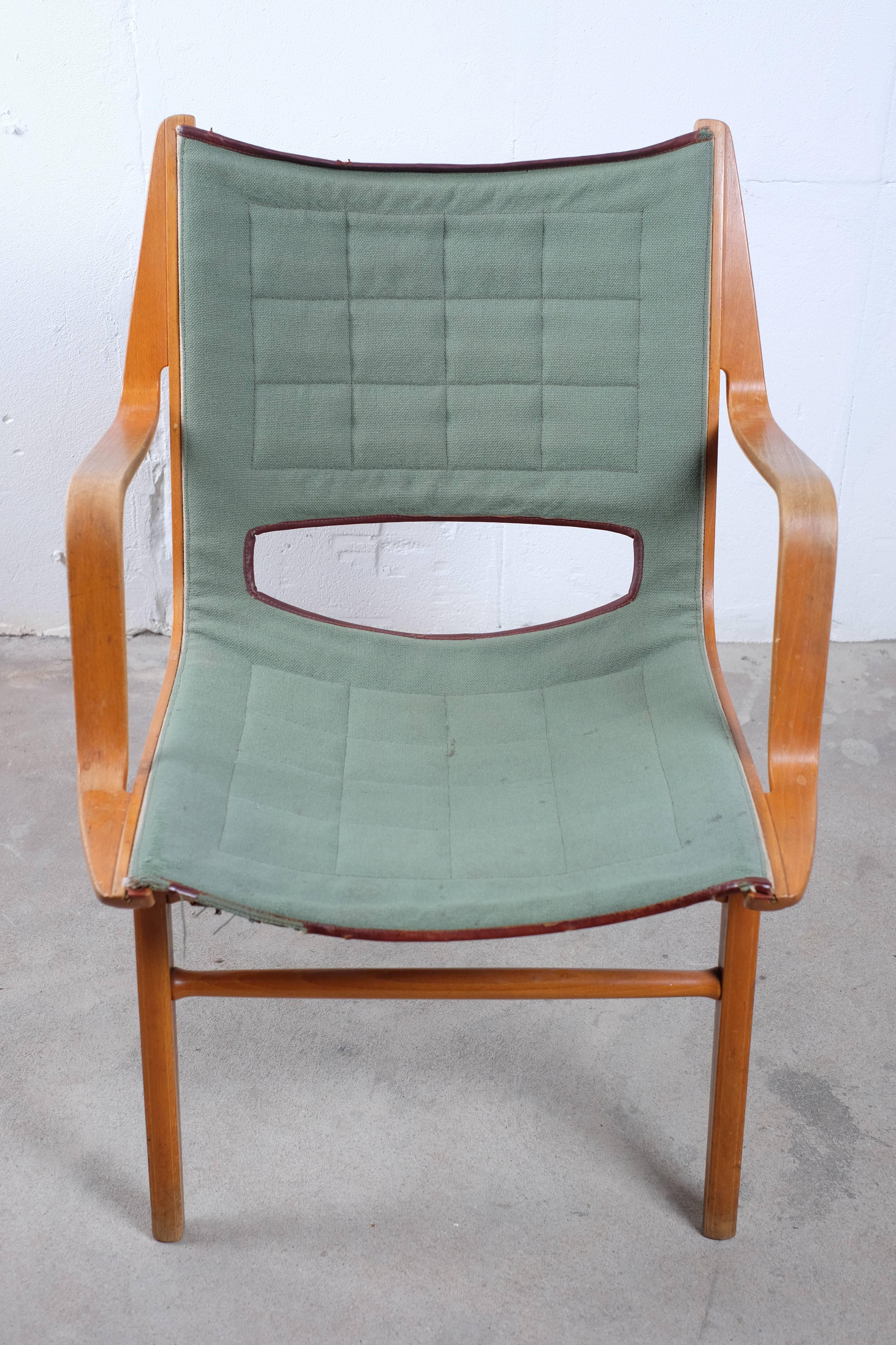 Peter Hvidt and Orla Mølgaard-Nielsen AX chair with light green canvas - designed 1949 for Fritz Hansen

The AX chair by Peter Hvidt and Orla Mølgaard-Nielsen was first manufactured in 1950 by Fritz Hansen and was constructed using Hansen's