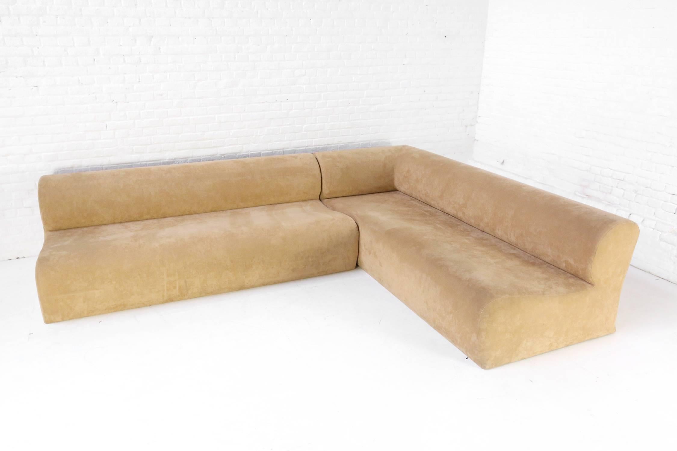 Beautiful Italian sofa in beige alcantara in excellent condition.

Dimensions: corner L 205cm x H 63cm x D 87cm
 left part: L 188cm x H 63cm.