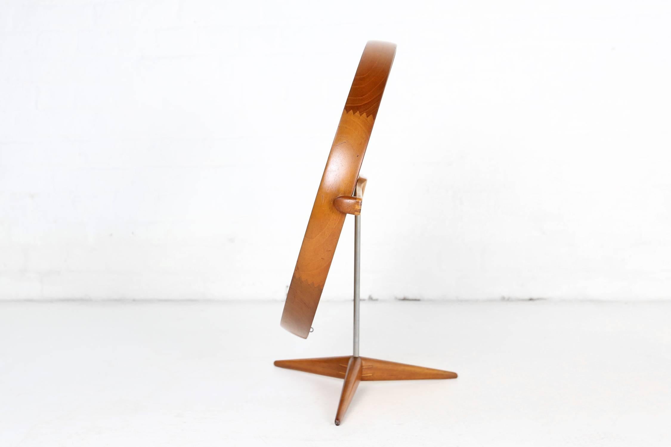 Framed table mirror on a wooden stand by to Uno & Osten Kristiansson for Luxus, Sweden. Nice decorative mirror executed in teak. Good condition.