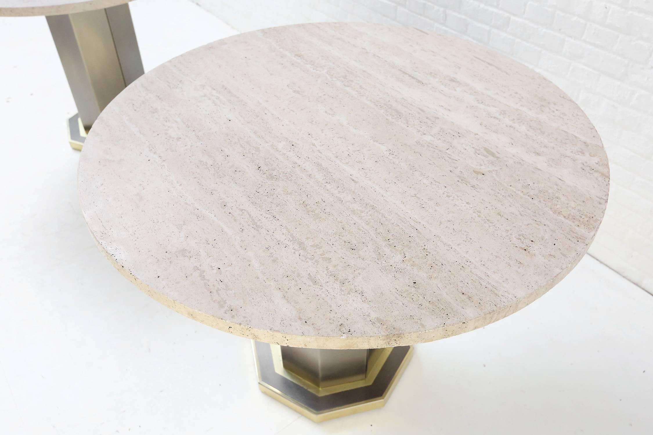 Rare pair of travertine dining tables with travertine top and brass and brushed steel bases, probably by Maison Jansen or Belgo Chrome.