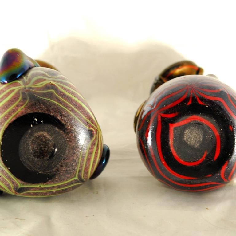 Pair of unique iridescent vases made by Sergio Rossi in the 1980s. Rare combination of techniques. Varigolatura, blob and dripping, iridescence.
Beautiful, unique pieces by Sergio Rossi. Heavy black iridescent free-form vase with background pinched