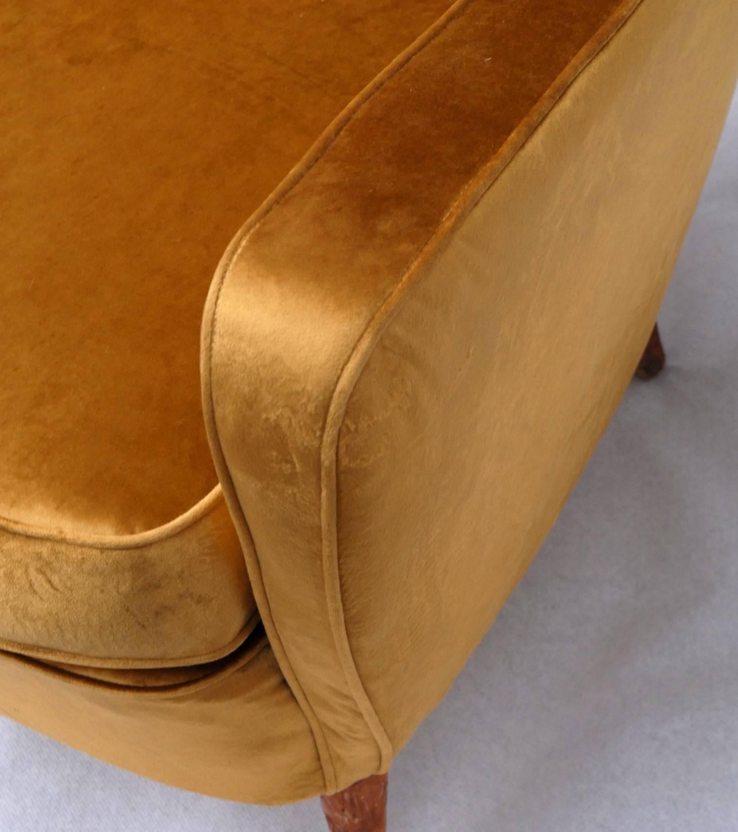 Organic curved armchair, icon of the 1950s. Double settee sofa available to match, not yet upholstered. Armchair was upholstered with rich and glamorous Alessandro Bini's Tuscan woven Flou gold velvet that enhances the curves and makes it just