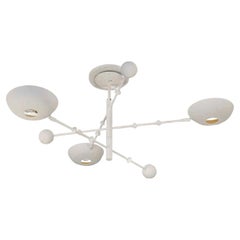 Orbitale chandelier with 3 rotating arms on the new Giacometti style finish.