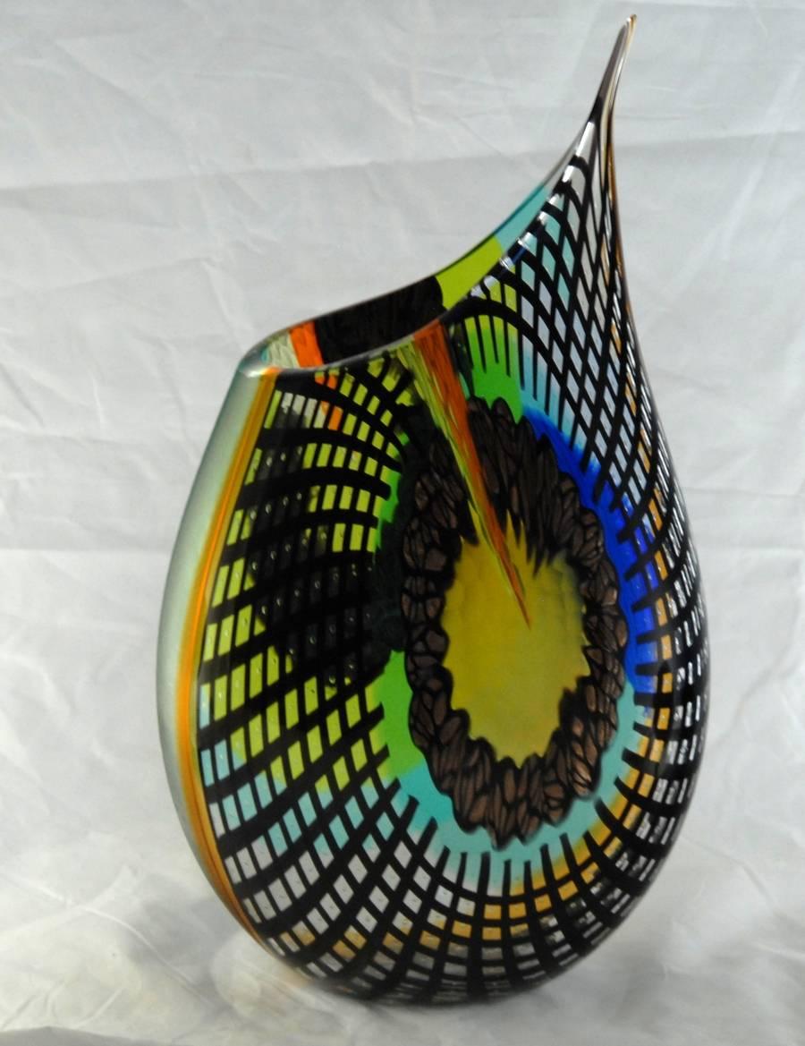 Vibrant vessel with incredible pattern and texture. One of a kind. Afro Celotto masterpiece showing his infinite imagination and virtuosity. This would be the focal point of your home.
While photographing this vase I started thinking about the