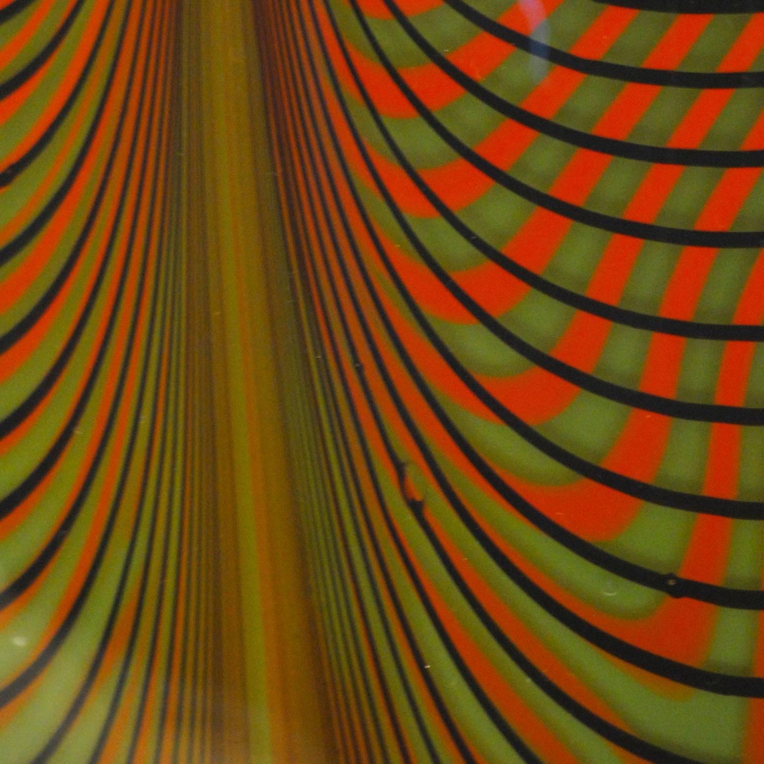 Tall vase by Alberto Donà. Feather fenicio effect over crossing striping of two colors. Rare, since most have two colors, not three.

Tall teardrop vase from Alberto Donà. This vase is created with a technique of striping spirals of glass with