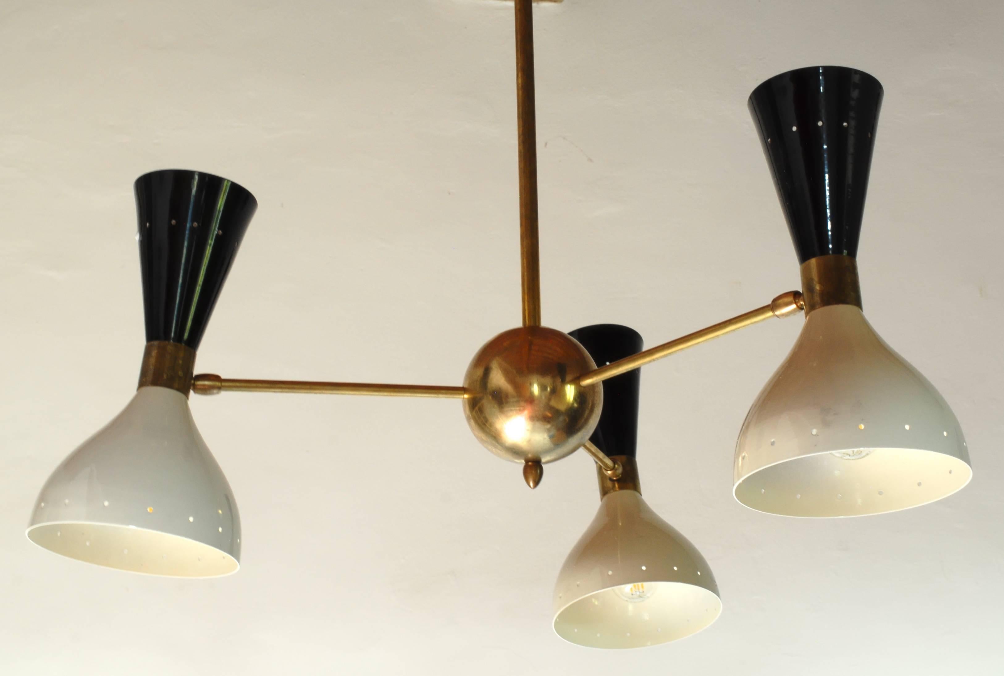 Lovely small chandelier for entries or corridors. Midcentury cluster three-arm chandelier with a Classic two-tone head.
 
Made by a lab specialized in midcentury restoration. Owner is a collector himself and connoisseur of the period. This