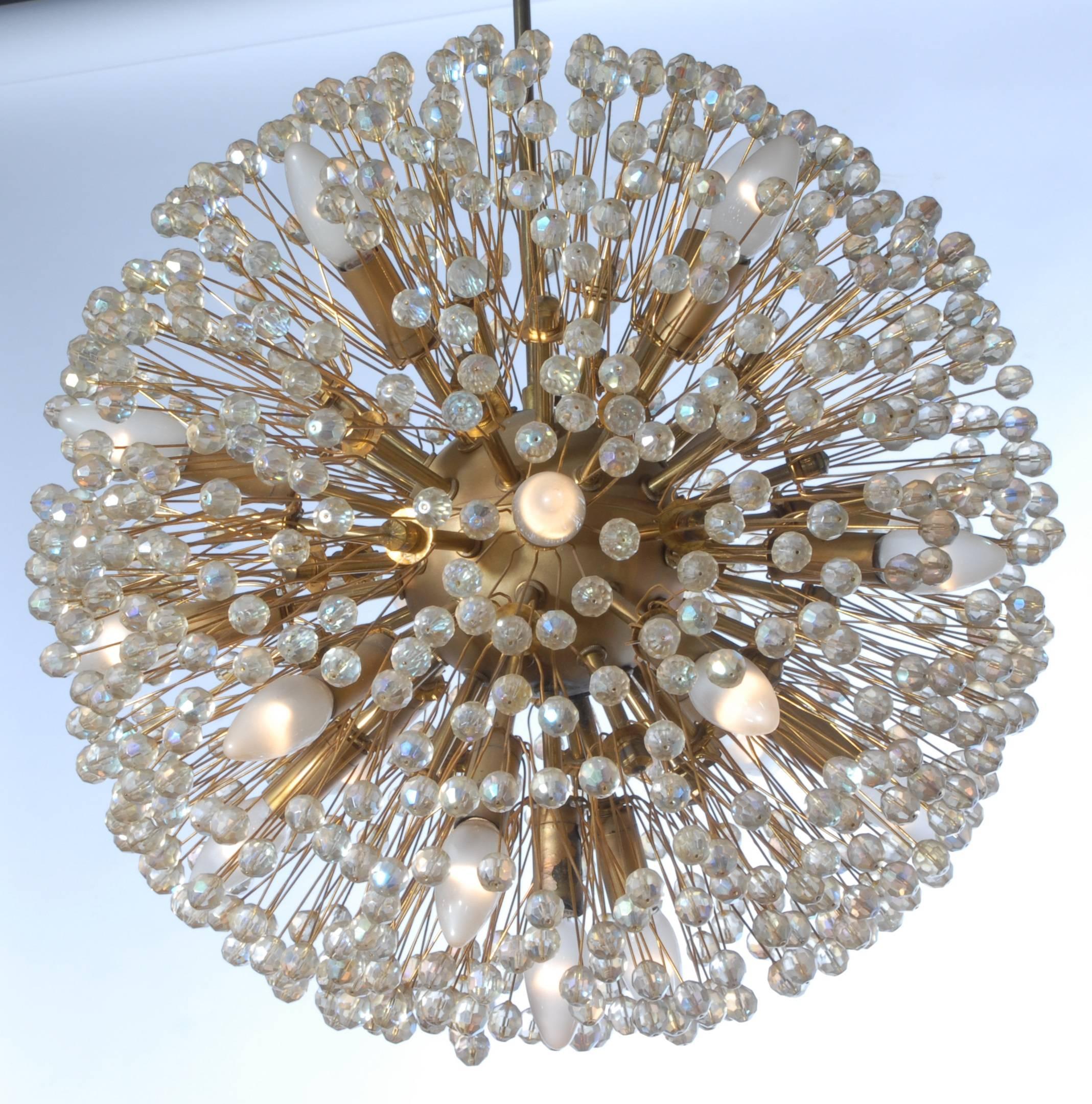 Extraordinary large chandeliers designed by Emil Stejnar and made in Vienna in 1960 by the famous Rupert Nikoll. Chandelier is made by an Austrian crystals. We offer set of six pieces, every piece is in excellent condition without any damages.