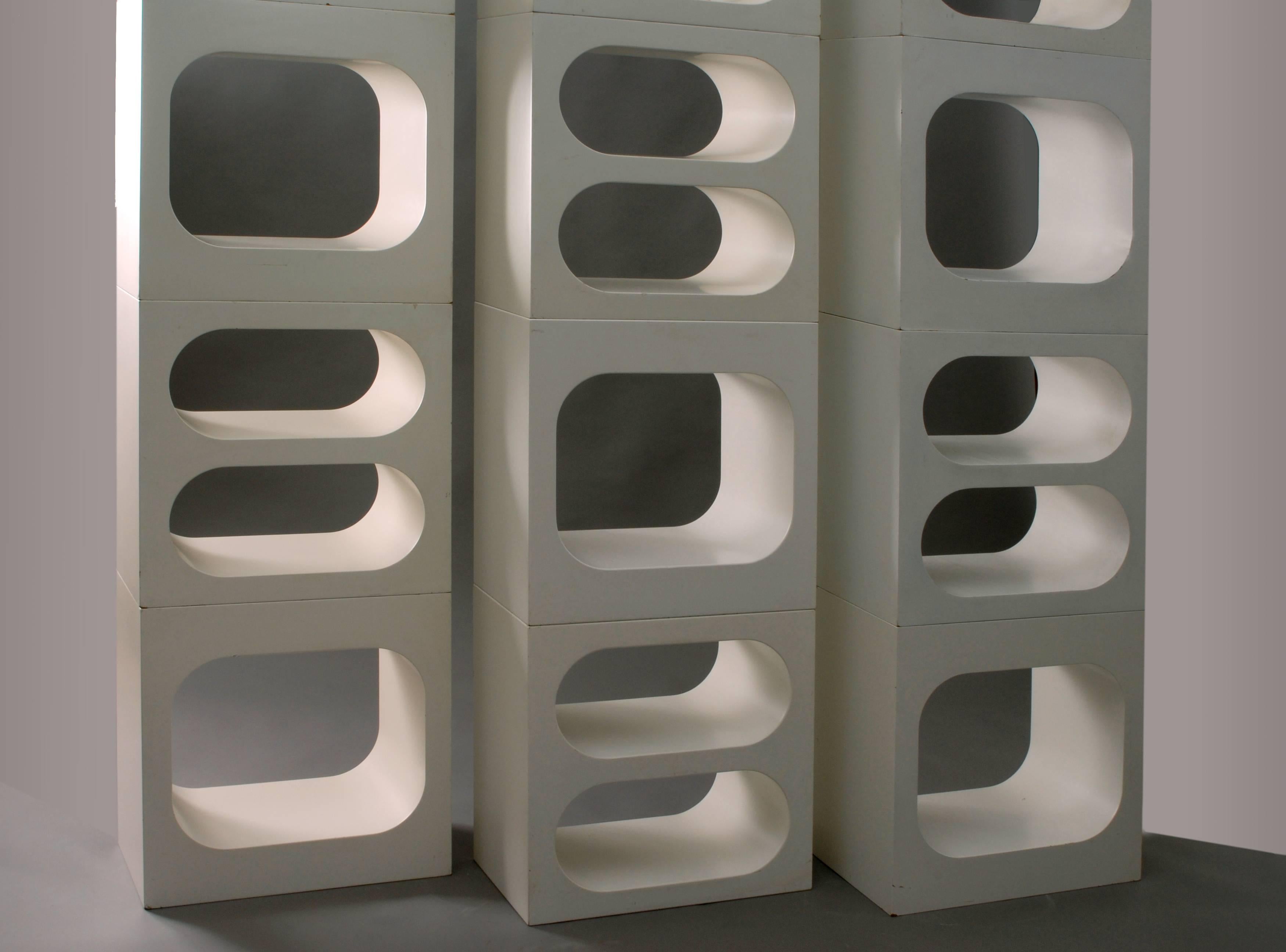 Formidable huge modular room divider which you can use as wall unit, sculpture, bookcase, room divider or separately. Each cube is 55 cm long, 55 cm high and 30cm deep. Cubes have metal base with white fiberglass cover, on surface are some minor