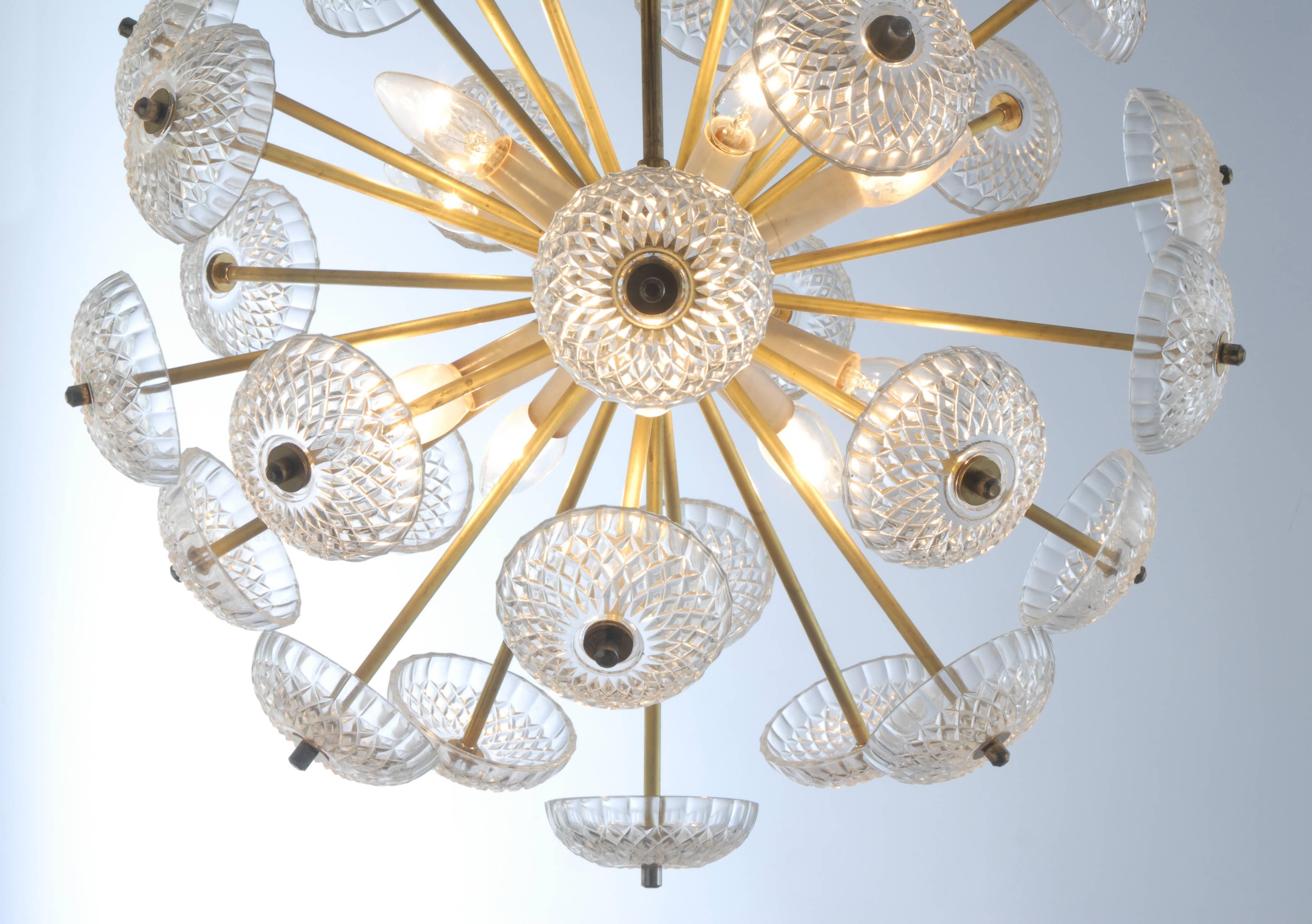 Large dandelion Sputnik chandelier in the style of Emil Stejnar, made in Czechoslovakia in 1970s. Heavy chandelier is made from brass and glass.