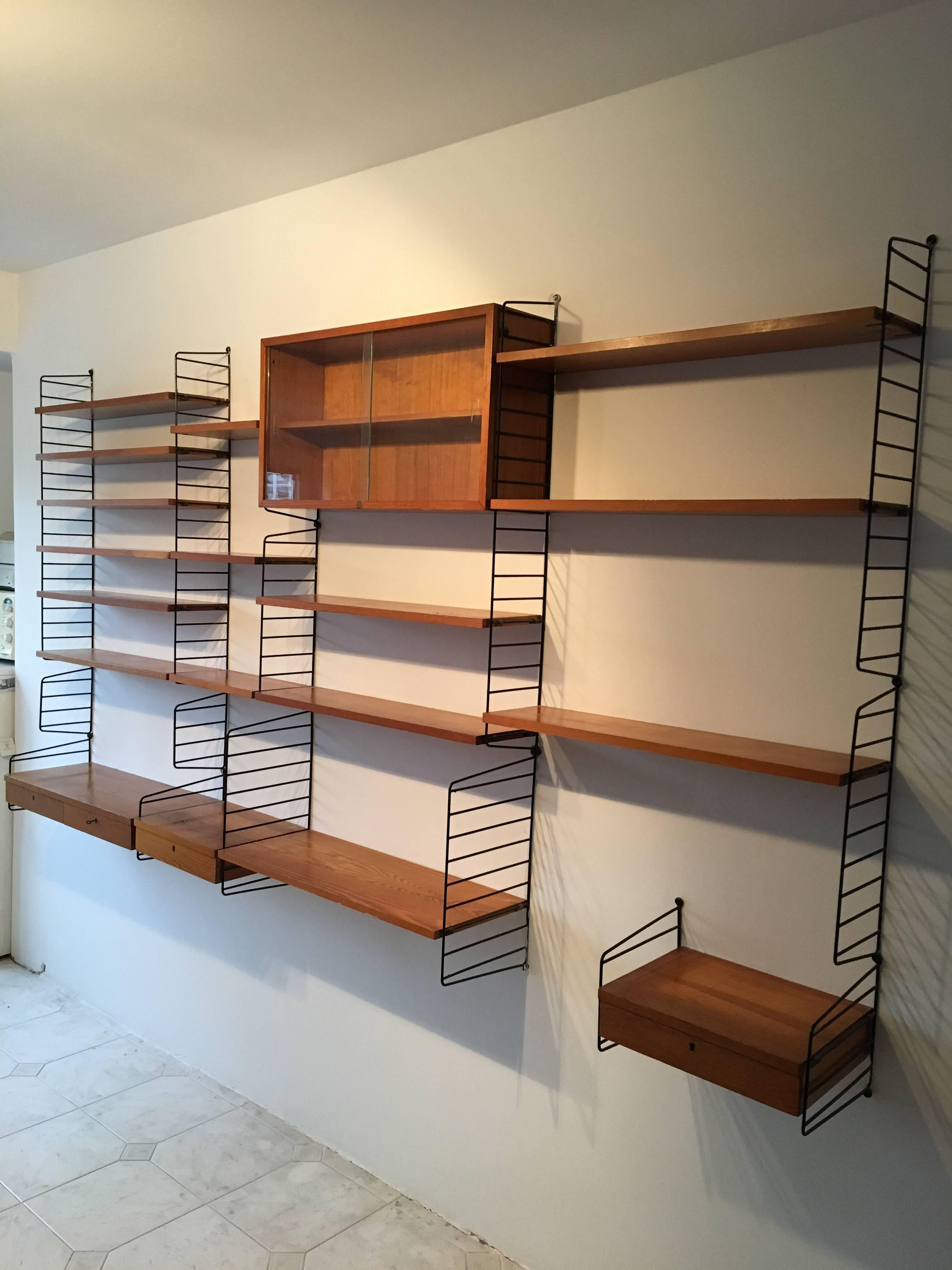 System shelf by Katta & Nisse Strinning for String.
The system has 19 shelves, 15 ladders and one cabinet.
The system is in very good previous condition.

  