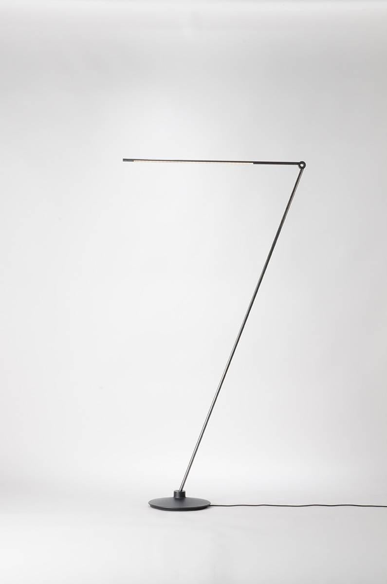 At 58 inch height the floor lamp can be rotated and pivoted to provide reading, accent or ambient light in various different settings. It’s thin profile is contemporary, while brass details and tubing combined with a cast iron base create a timeless