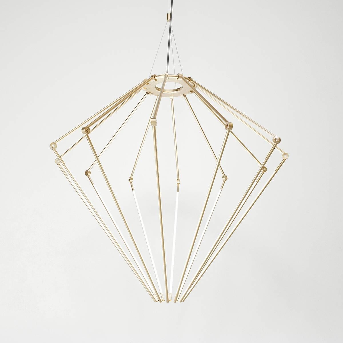 Introducing the latest achievement in lighting design from Brooklyn-based studio, Juniper—the THIN chandelier is an elegant fixture that appears to suspend and illuminate magically, as if there is no wiring or weight.
Juniper collaborated with
