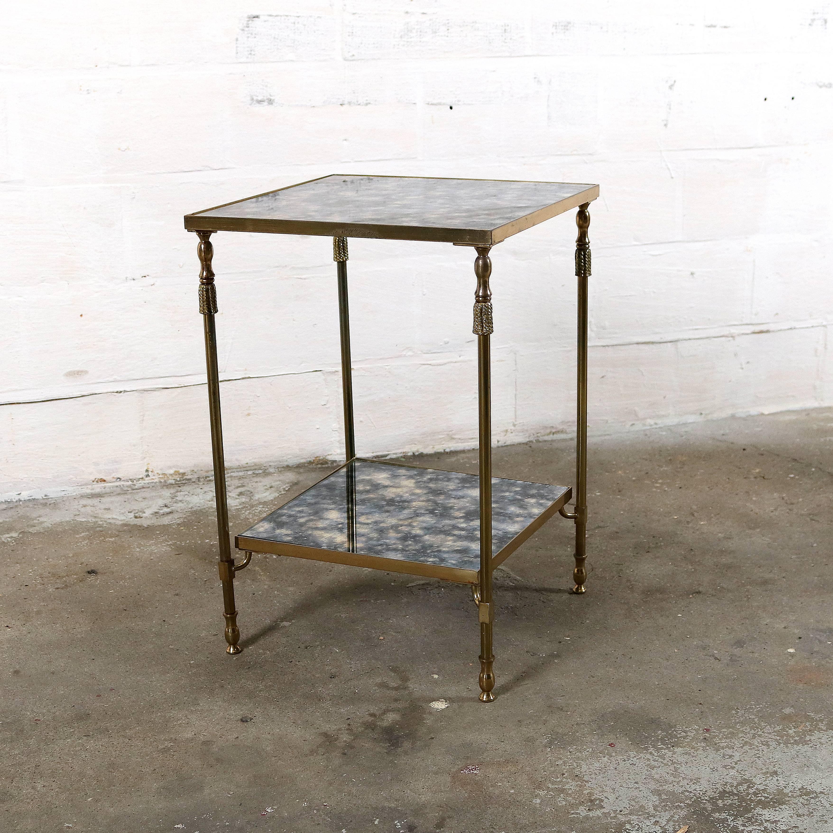 Maison Jansen side table with brass frame and
flamed glass.