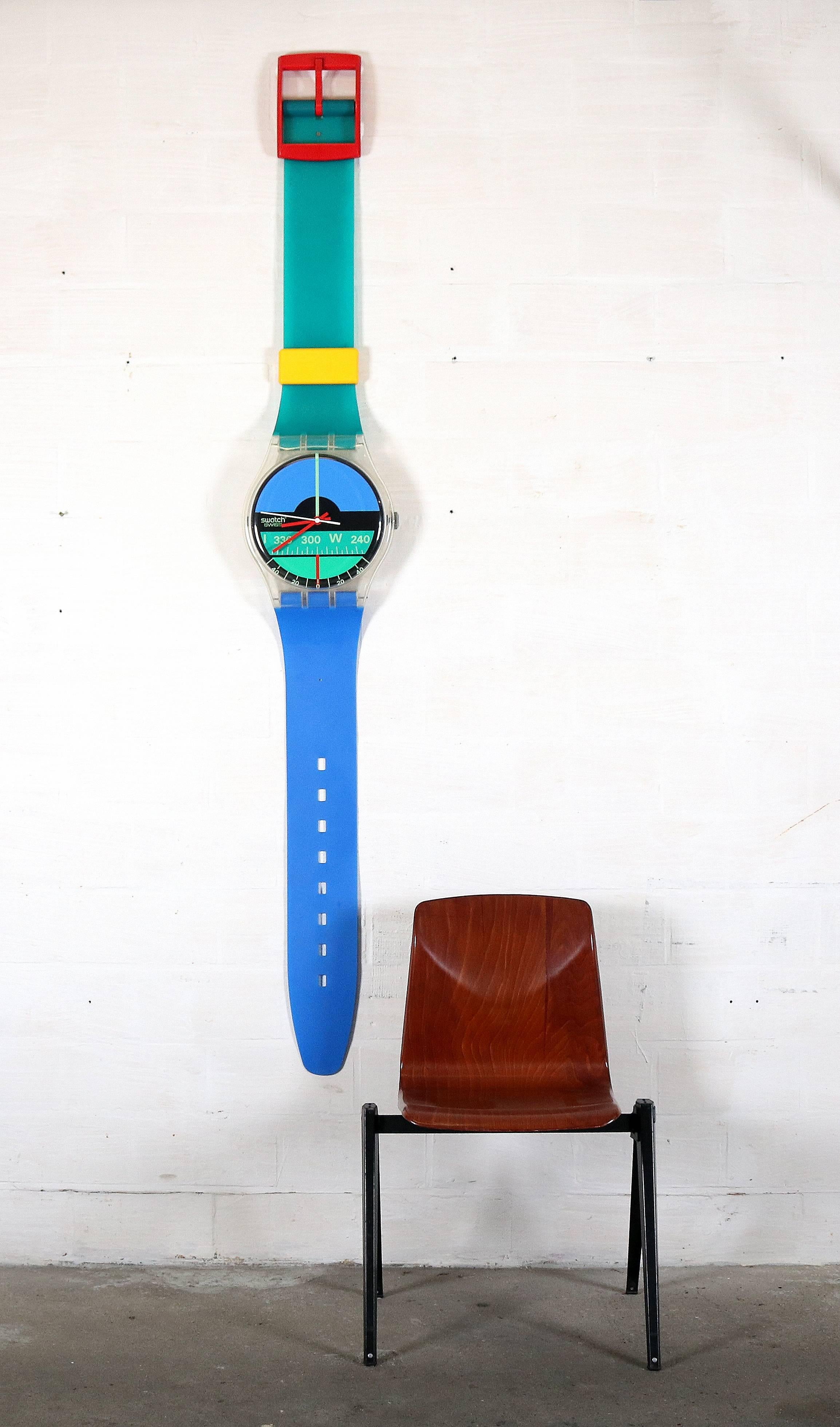 Big clock of the watch brand Swatch.
This watch of the Nautilus Aqua Love collection was made in 1987.
In a good vintage condition.