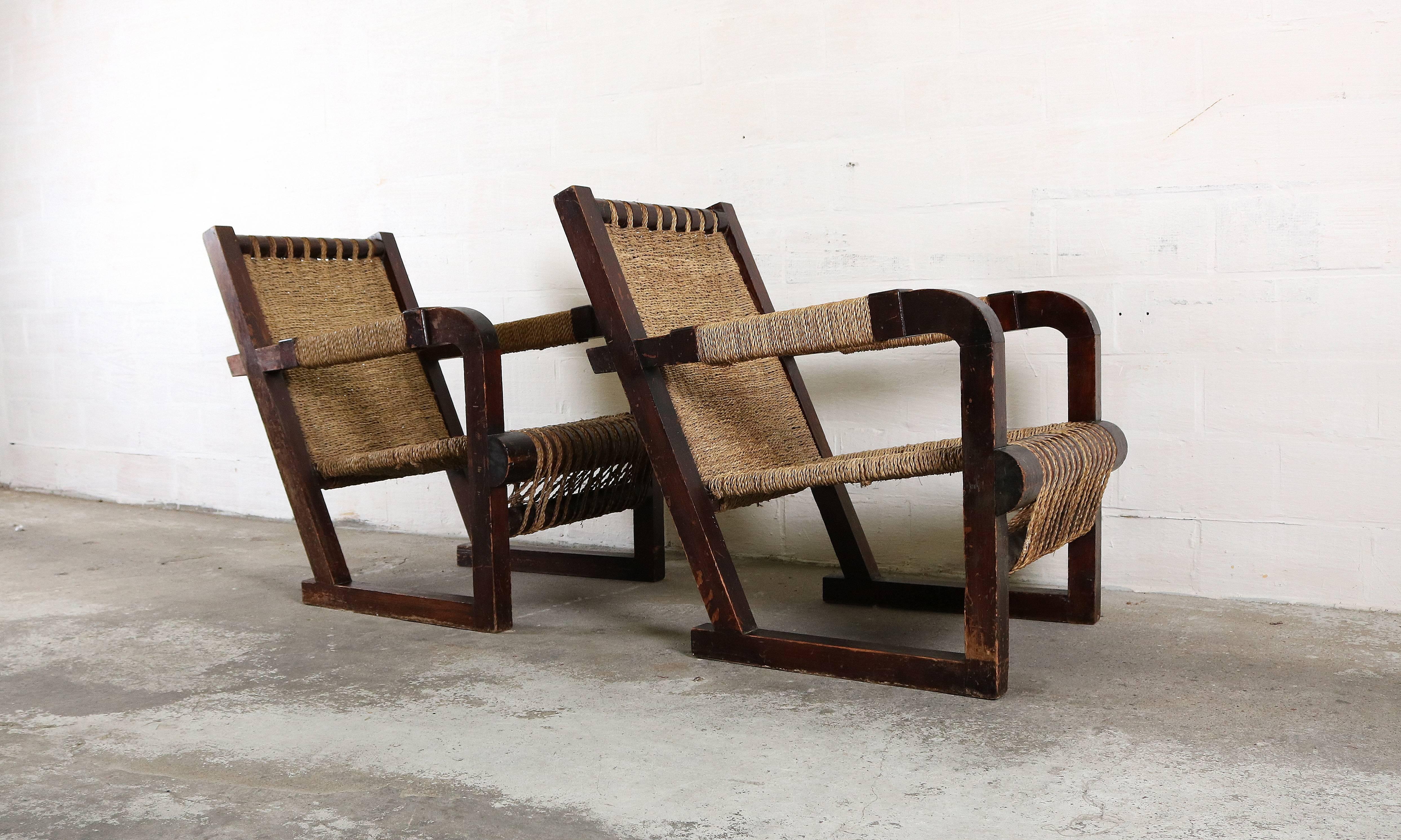 Art Deco lounge chairs by French designer Francis Jourdain, circa 1930.
Made of oak and woven seat.
In full original condition.