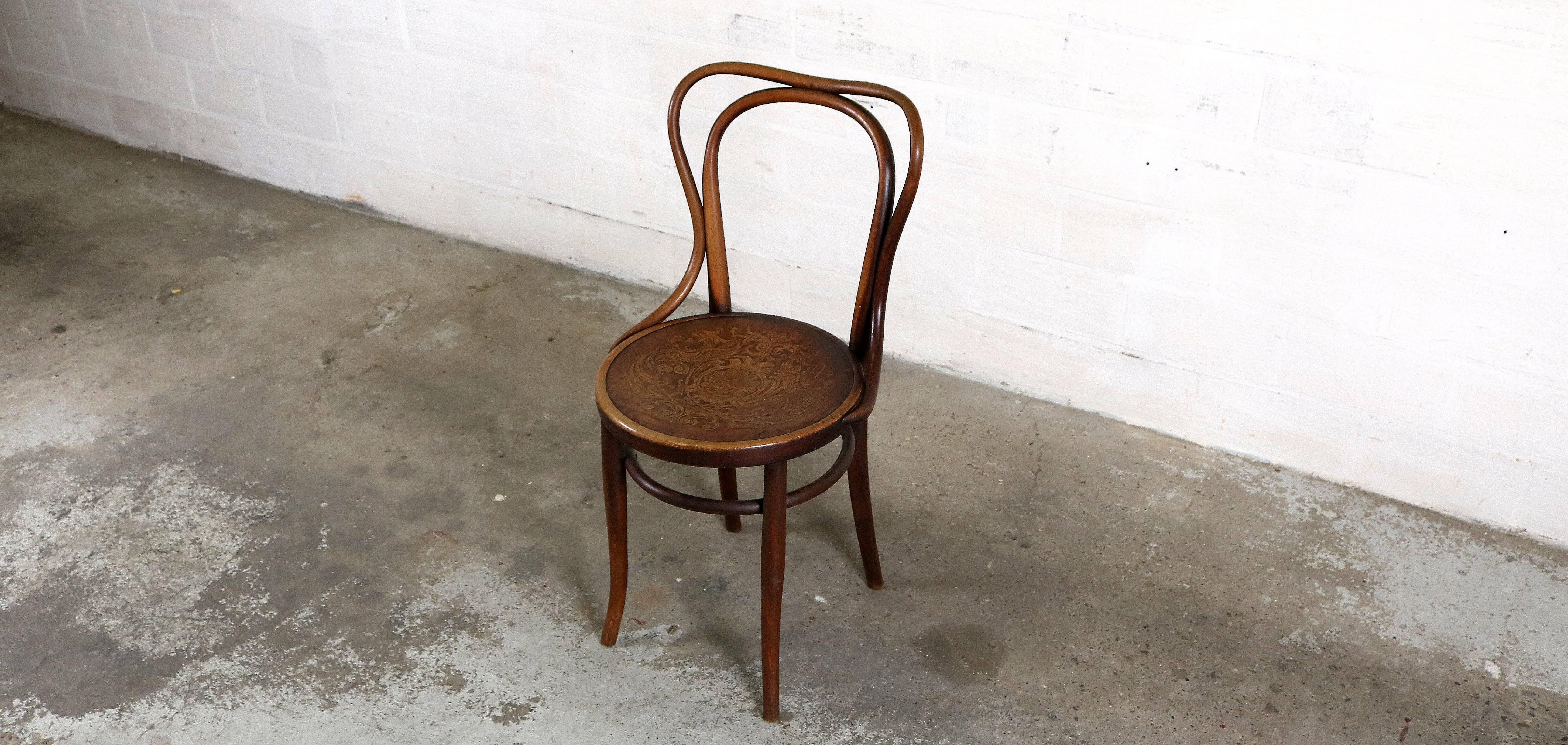 Antique chair by Jacob & Josef Kohn.
With beautiful motif on the seat.