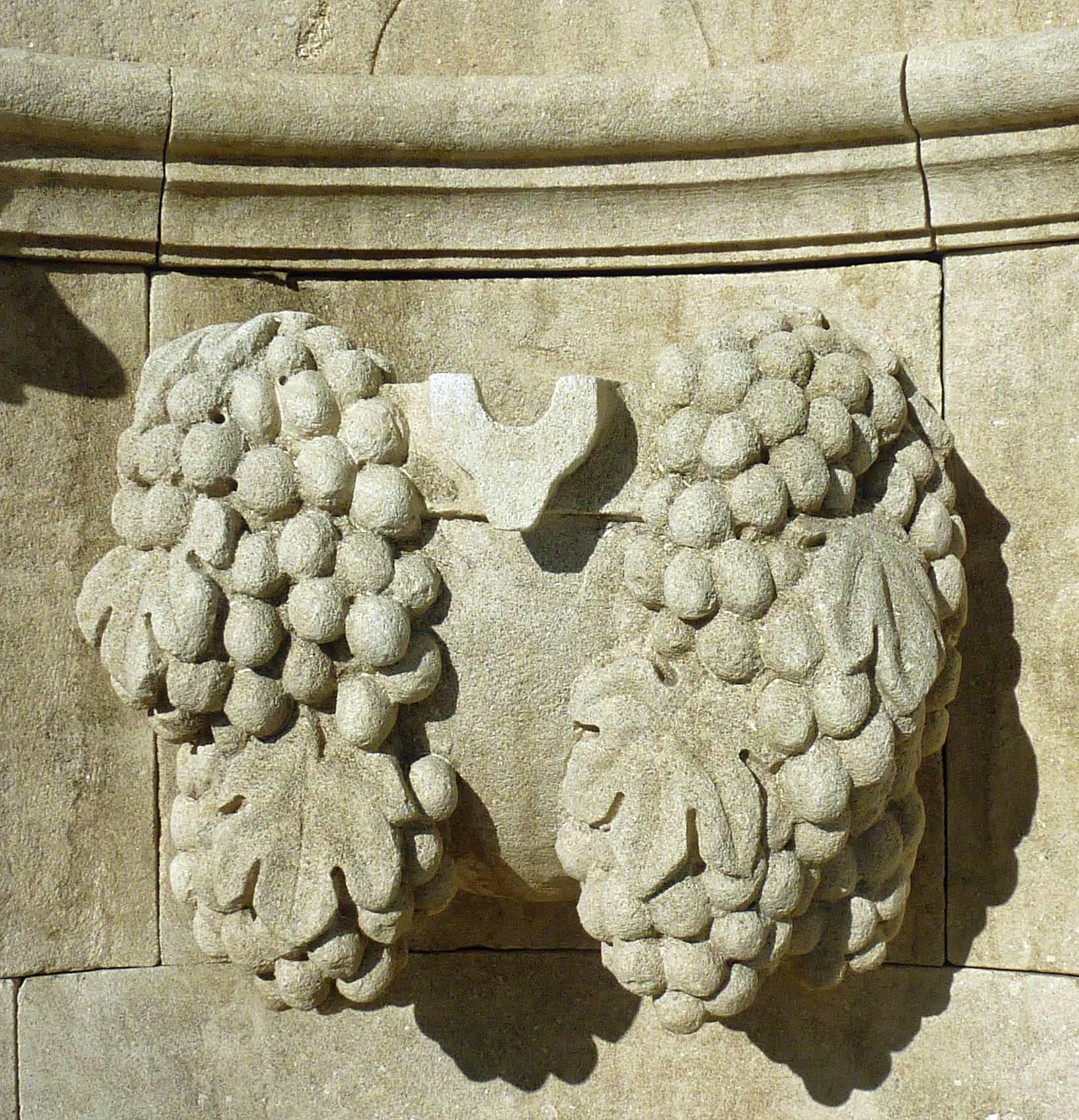 Contemporary Impressive Wall Fountain in French Natural Limestone with Hand Sculpted Vine For Sale