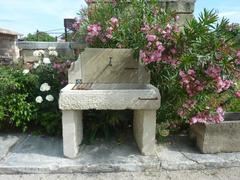 Summer Kitchen in Stone and Wrought Iron with Monolithic Sink, Jambs, Pediment