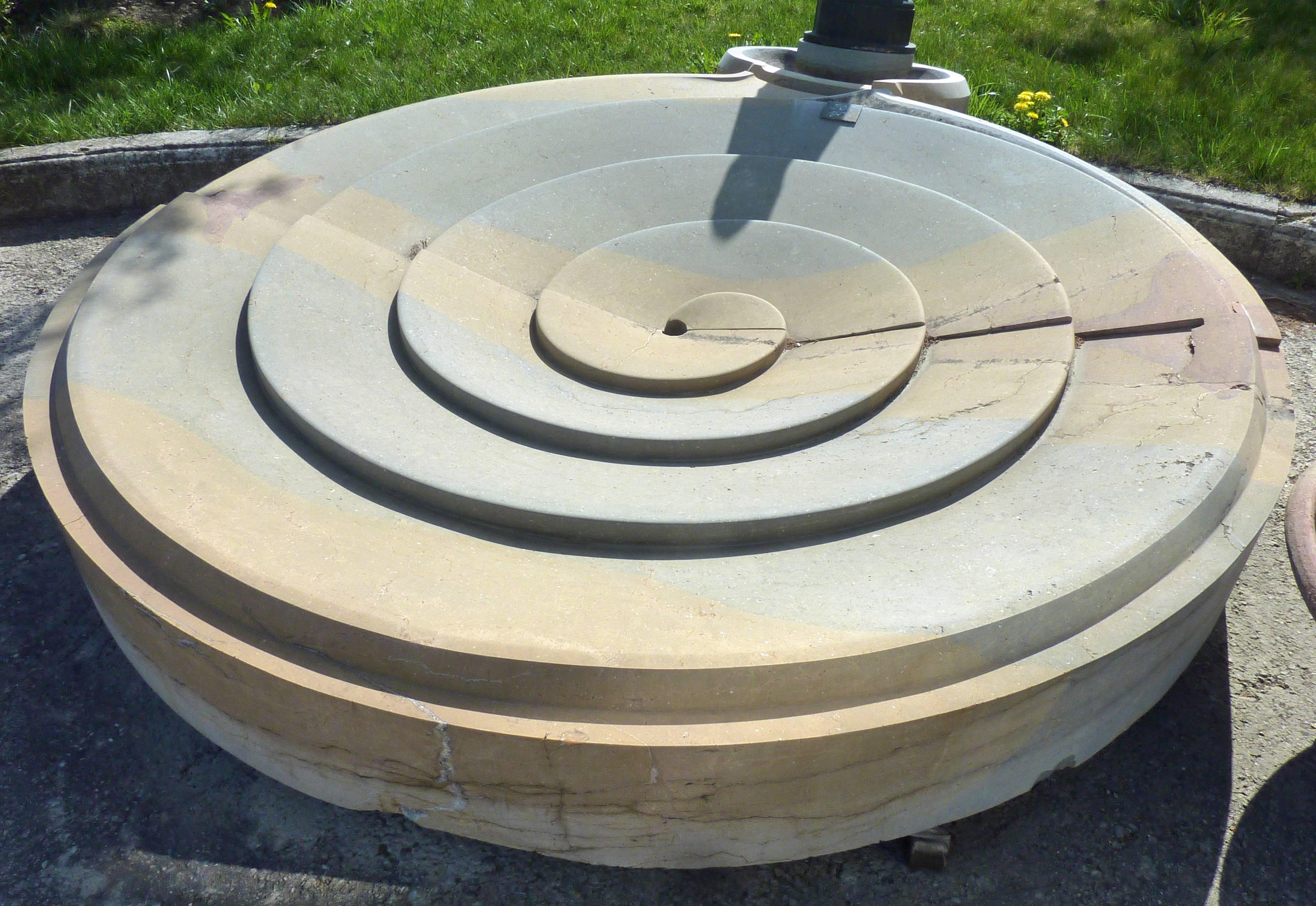 Hand-Carved 21st Century Central Fountain with Spiraling Basin in Stone and Iron Water Pump For Sale