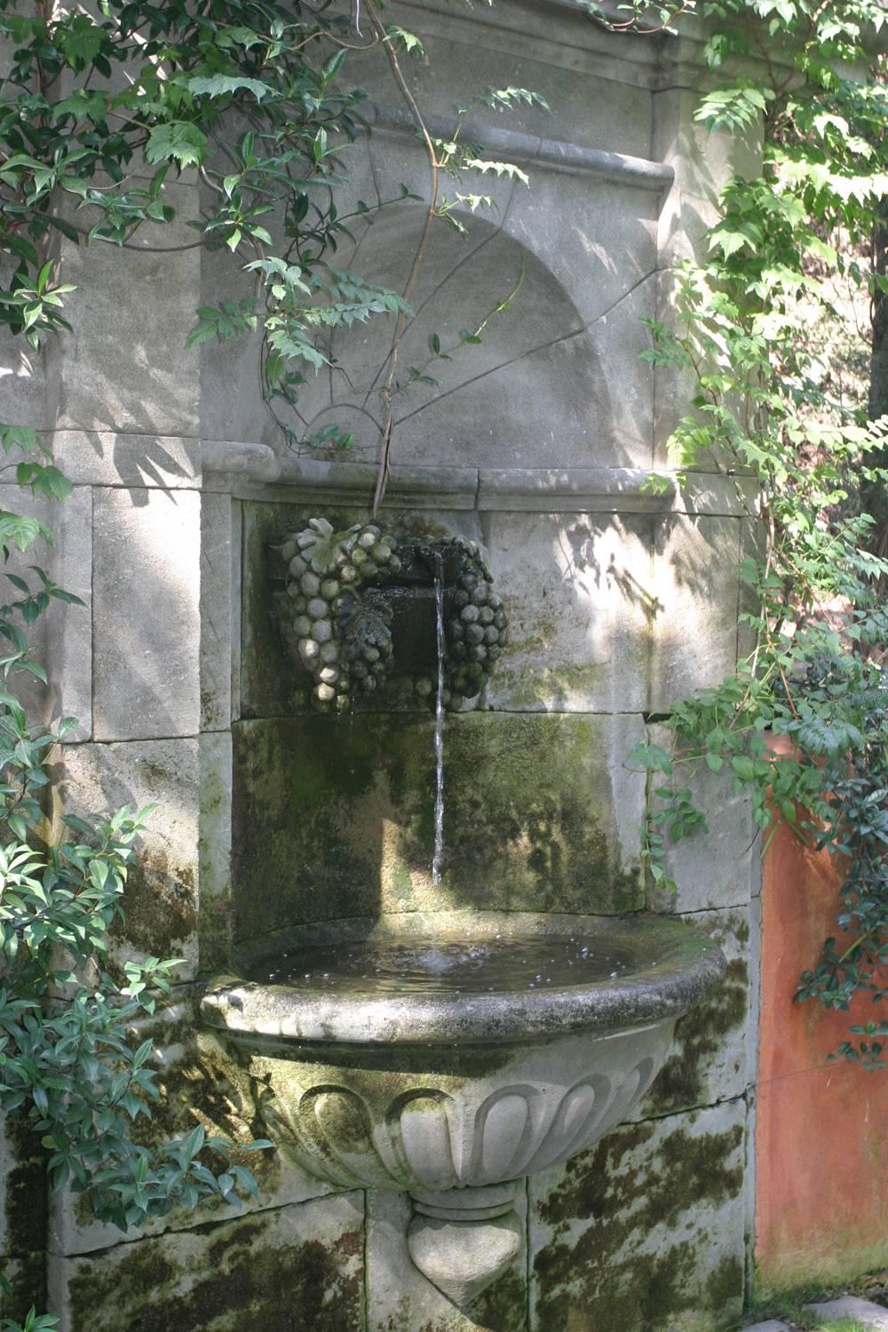 Impressive Wall Fountain in French Natural Limestone with Hand Sculpted Vine For Sale 1
