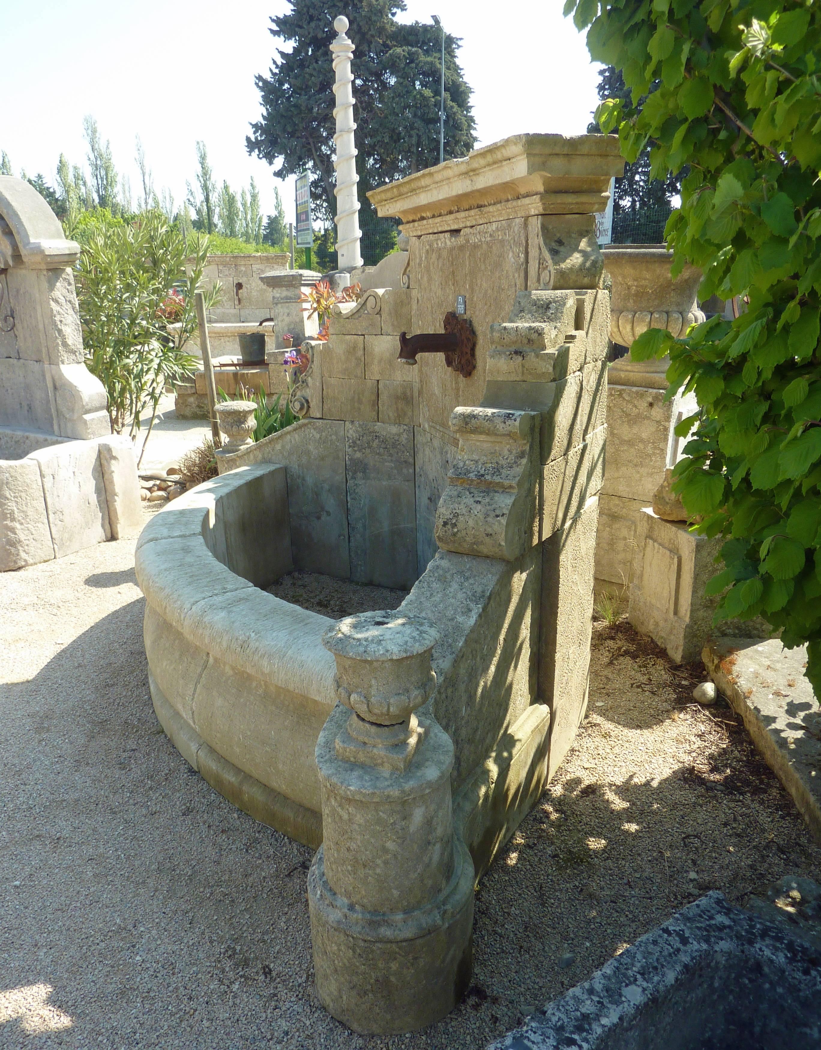 Unique Wall-Fountain Carved in French Limestone with Curved Basin and Sculptures 4