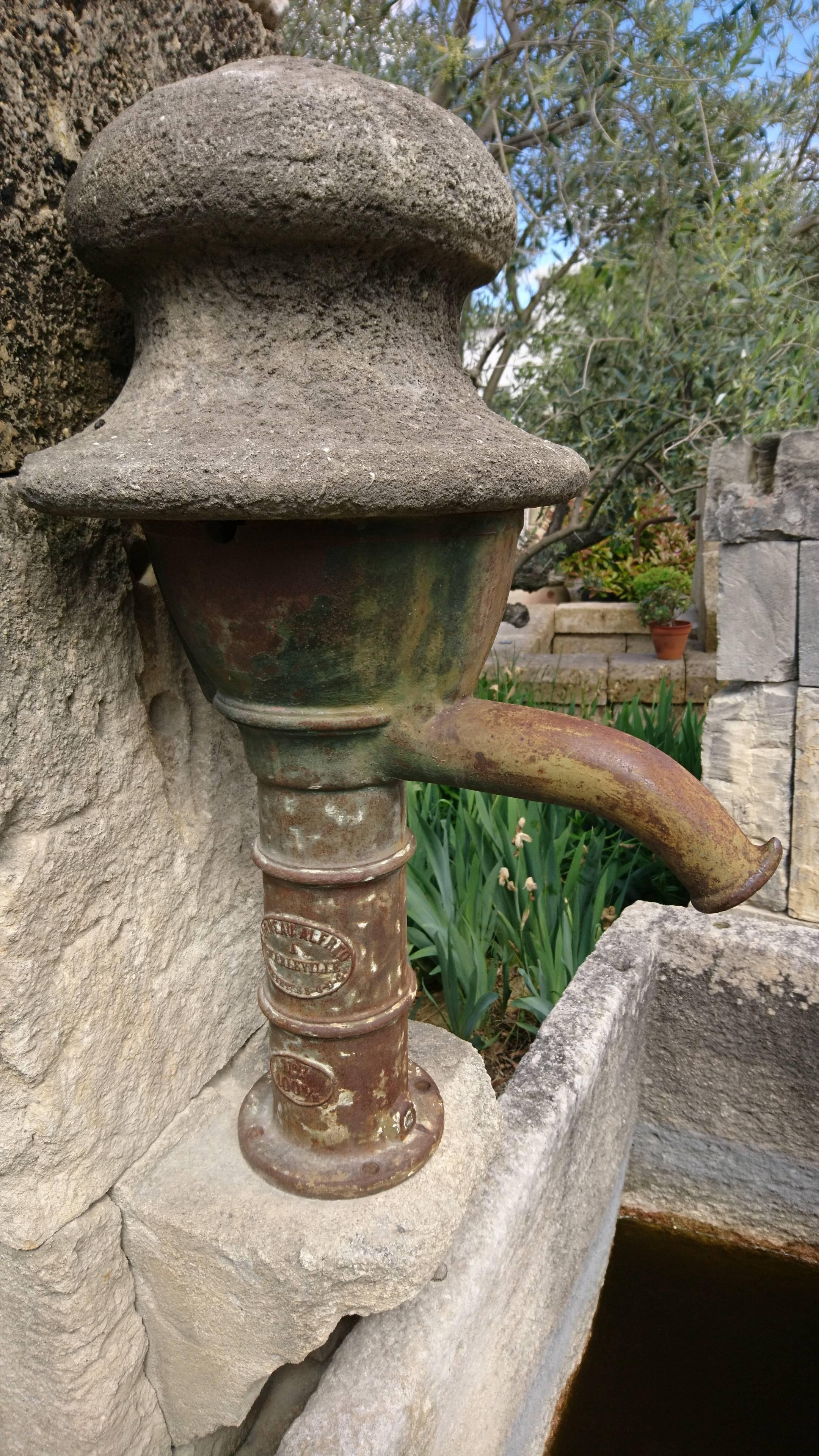 Carved Antique Wall-Fountain with Ancient Manual Water Pump and Monolith Stone Basin For Sale