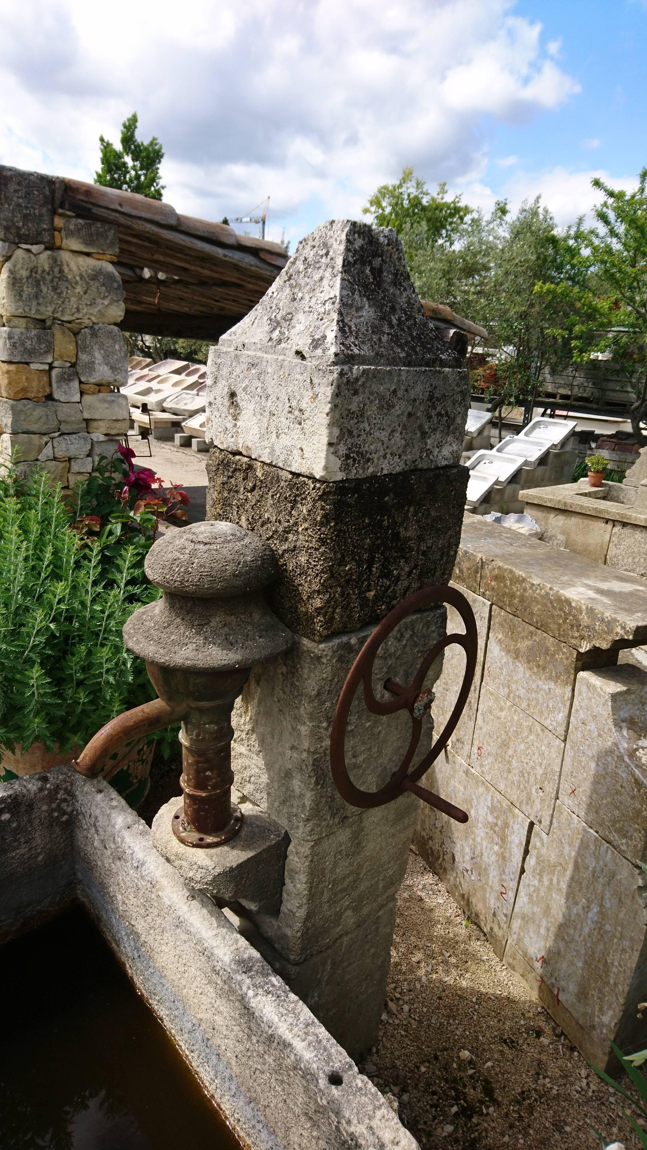 Antique Wall-Fountain with Ancient Manual Water Pump and Monolith Stone Basin In Good Condition For Sale In Isle sur la Sorgue, FR