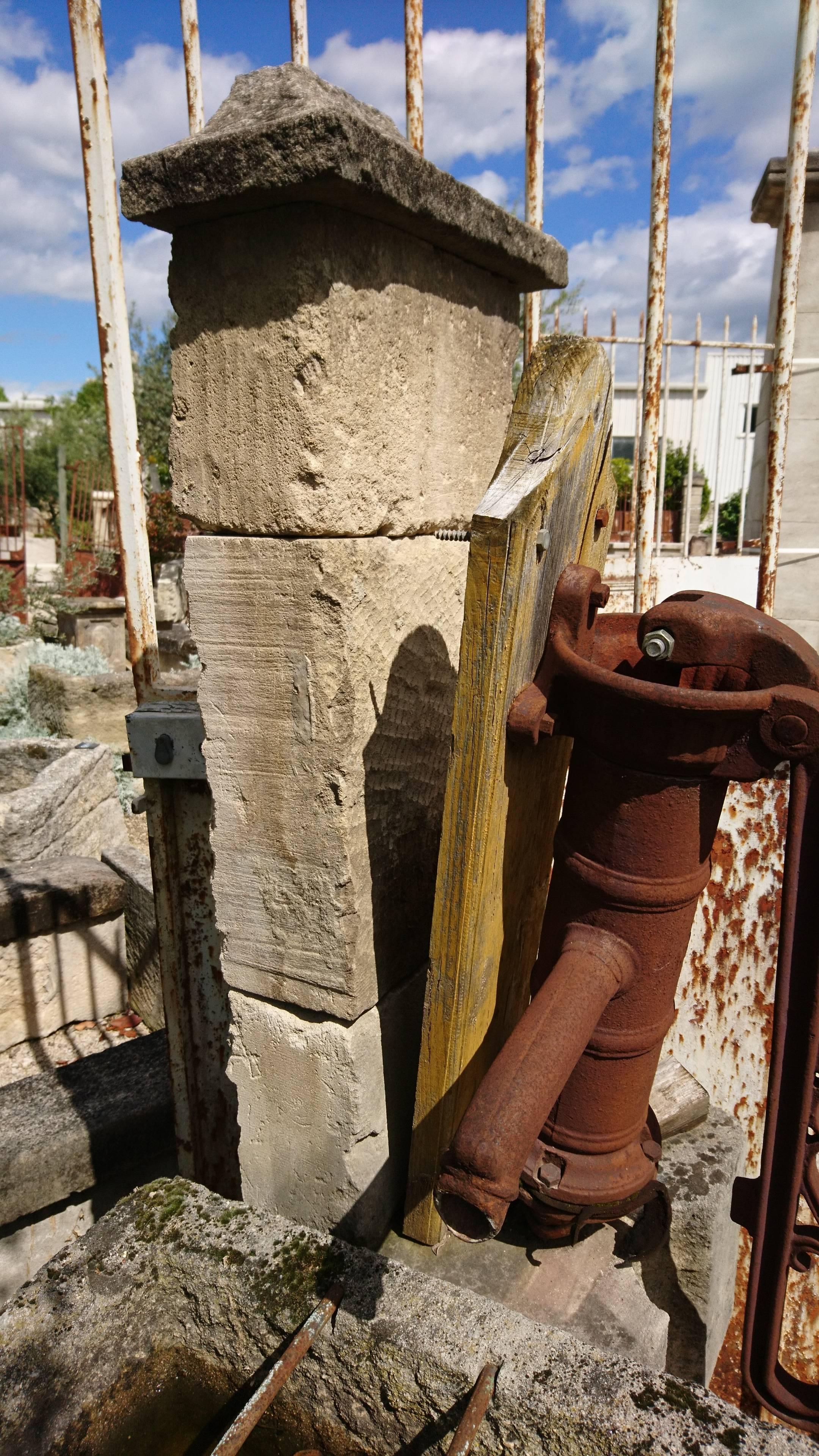 Antique Stone Fountain with Two Monolithic Basins, Column and Manual Water Pump In Good Condition For Sale In Isle sur la Sorgue, FR