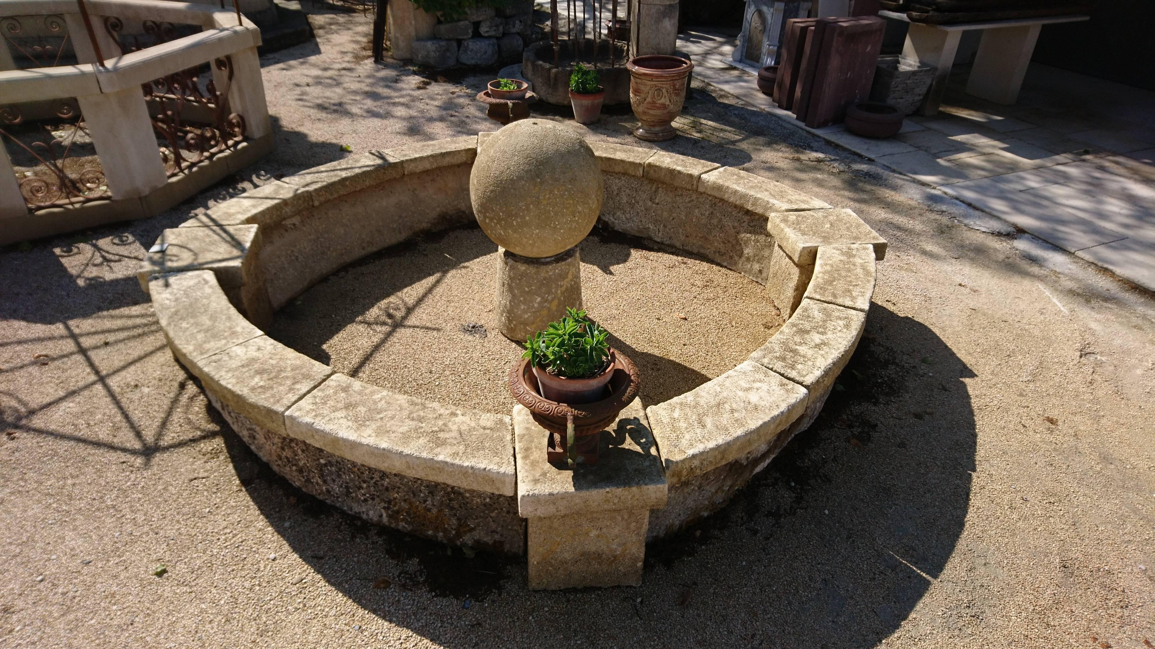 French Antique Limestone Oval Basin with Thick Copings and Large Central Ball, Provence