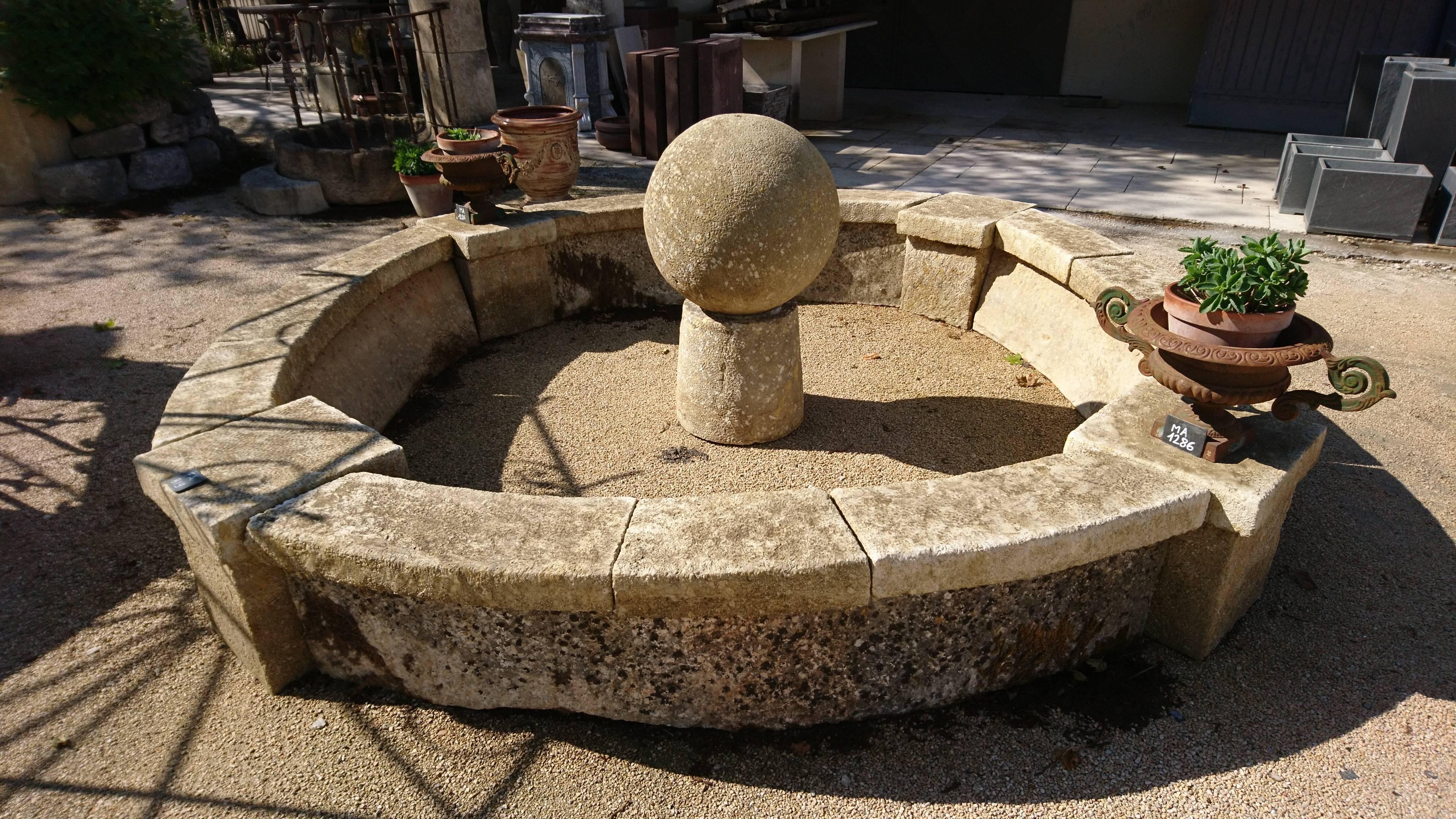 This very original basin made of reclamed stones would be the ideal element to perfect the decoration of your garden! Its a-typical shape and its beautiful natural patina make it a must-have.

This basin is composed of curved massive stones which