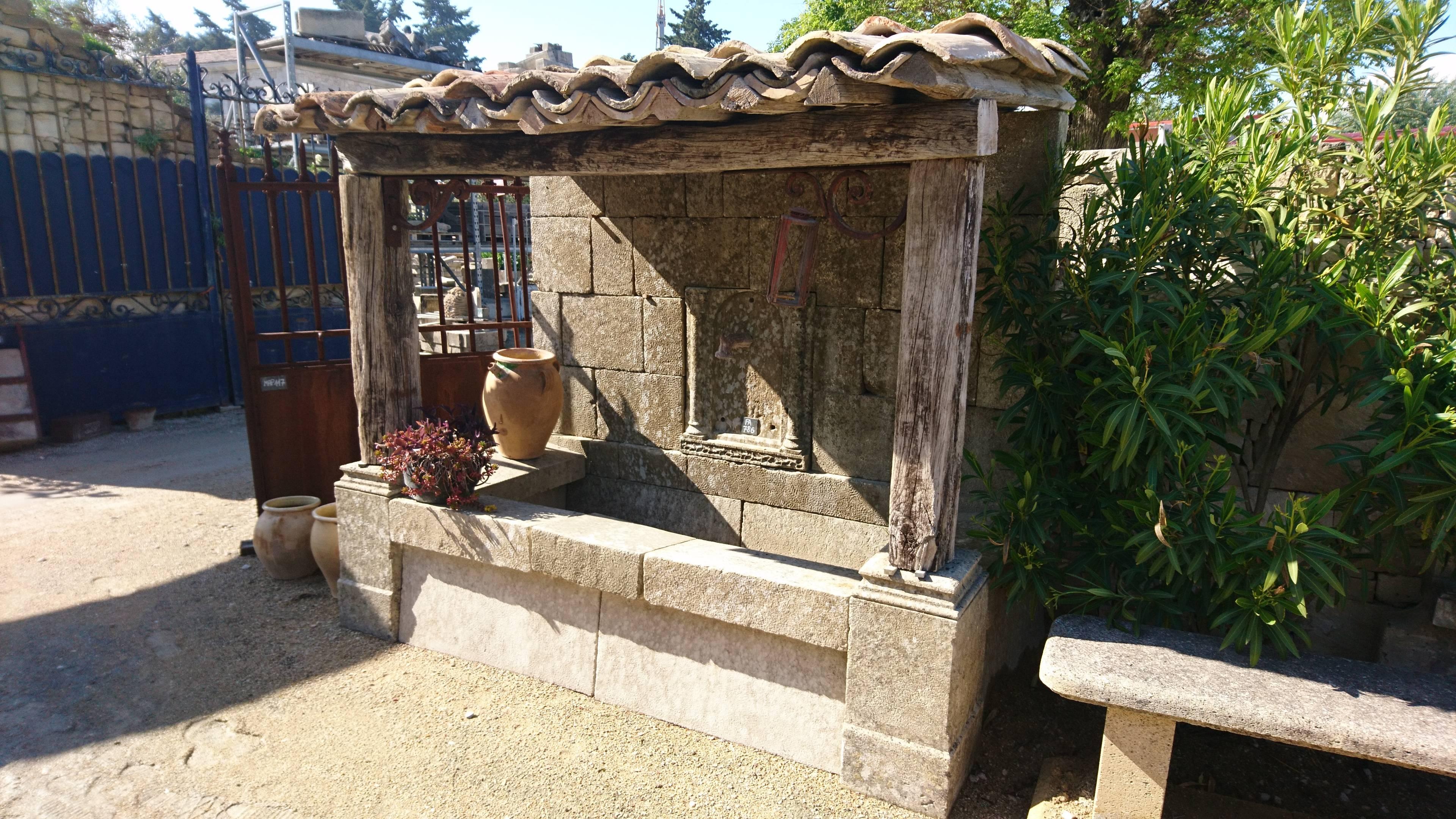 If you are looking for something unique, original and full of charm to enhance your garden, then this superb fountain composed of genuine antique materials might be the answer!

This wall fountain has been built to looks like an antique covered