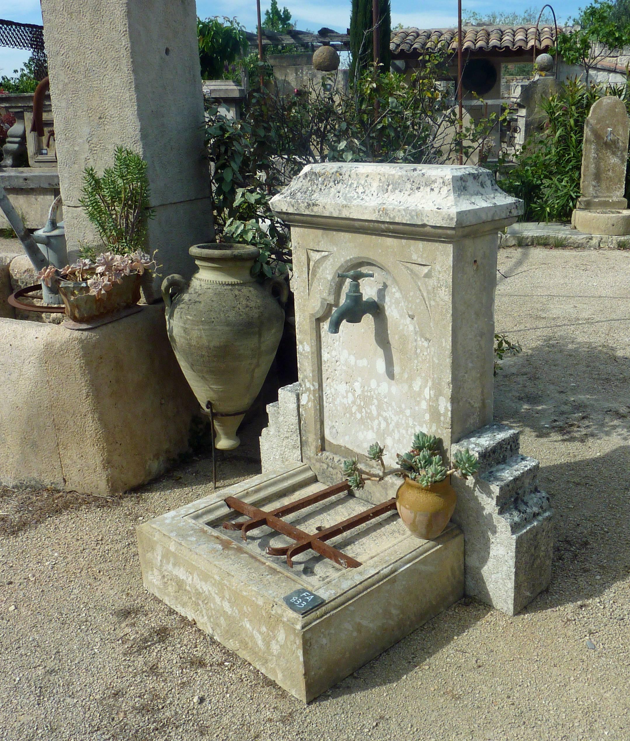 French Small Water Fountain with Basin, Sculpted Pediment and Molded Corbels in Stone