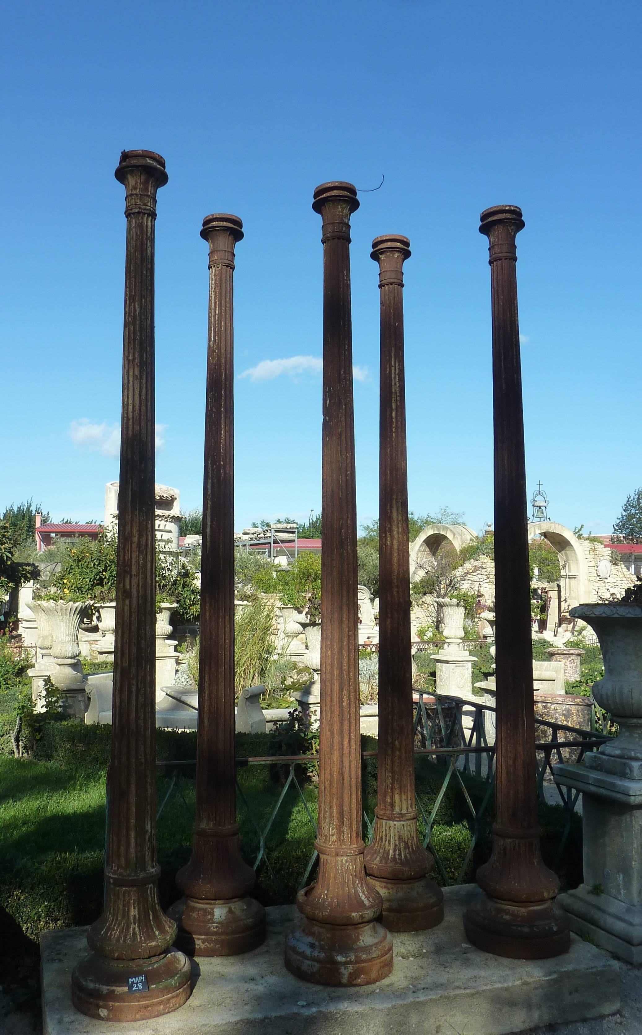 This real antique Doric column dates back to the 19th century. Made of cast-iron, the hollowed column features a finger-fluted body. The upper part is beautifully decorated with a Bolection style collar. The base of this column is larger and