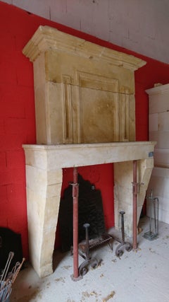 17th Century Louis XIII Stone Fireplace with Hand-Sculpted Trumeau, Provence