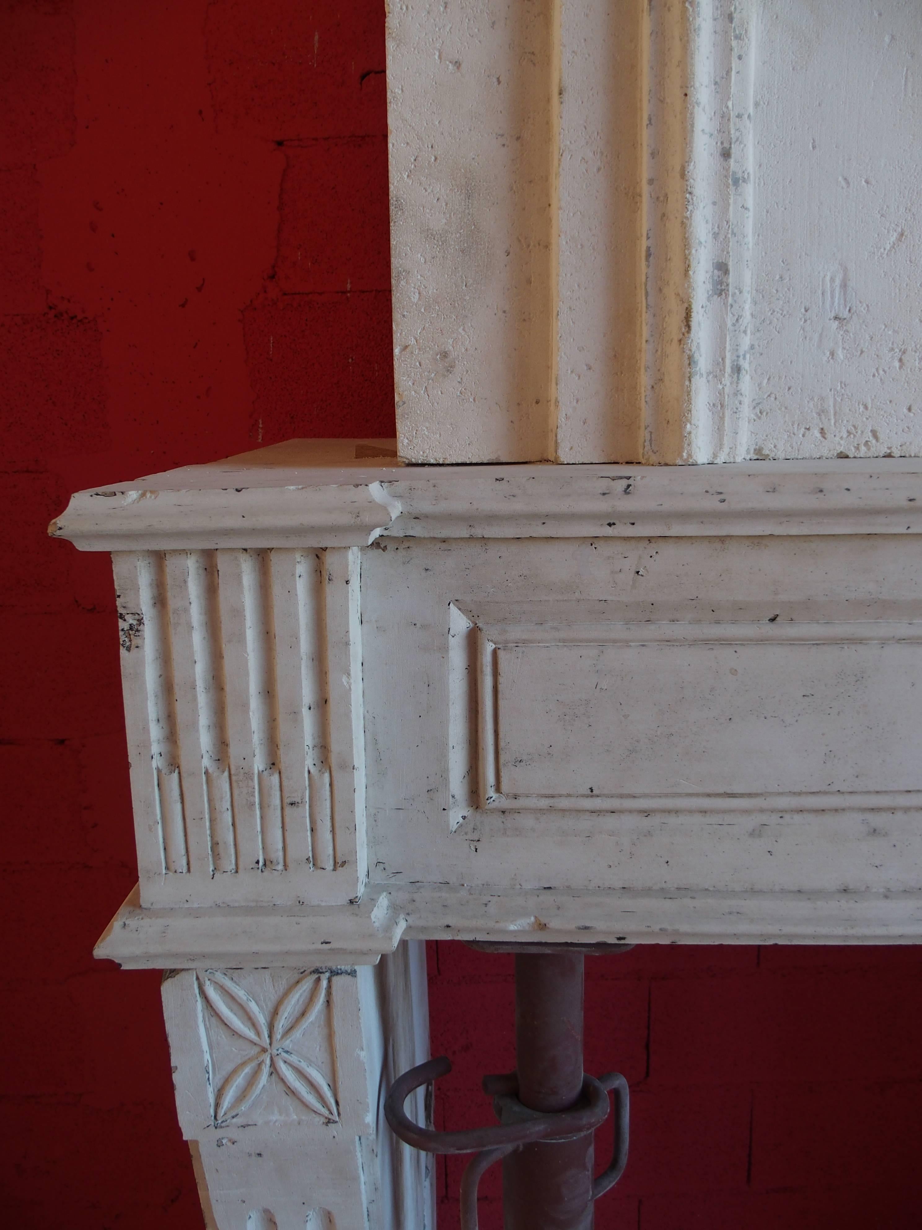 18th Century Louis XVI Stone Fireplace with Trumeau and Geometric Design, France For Sale 1