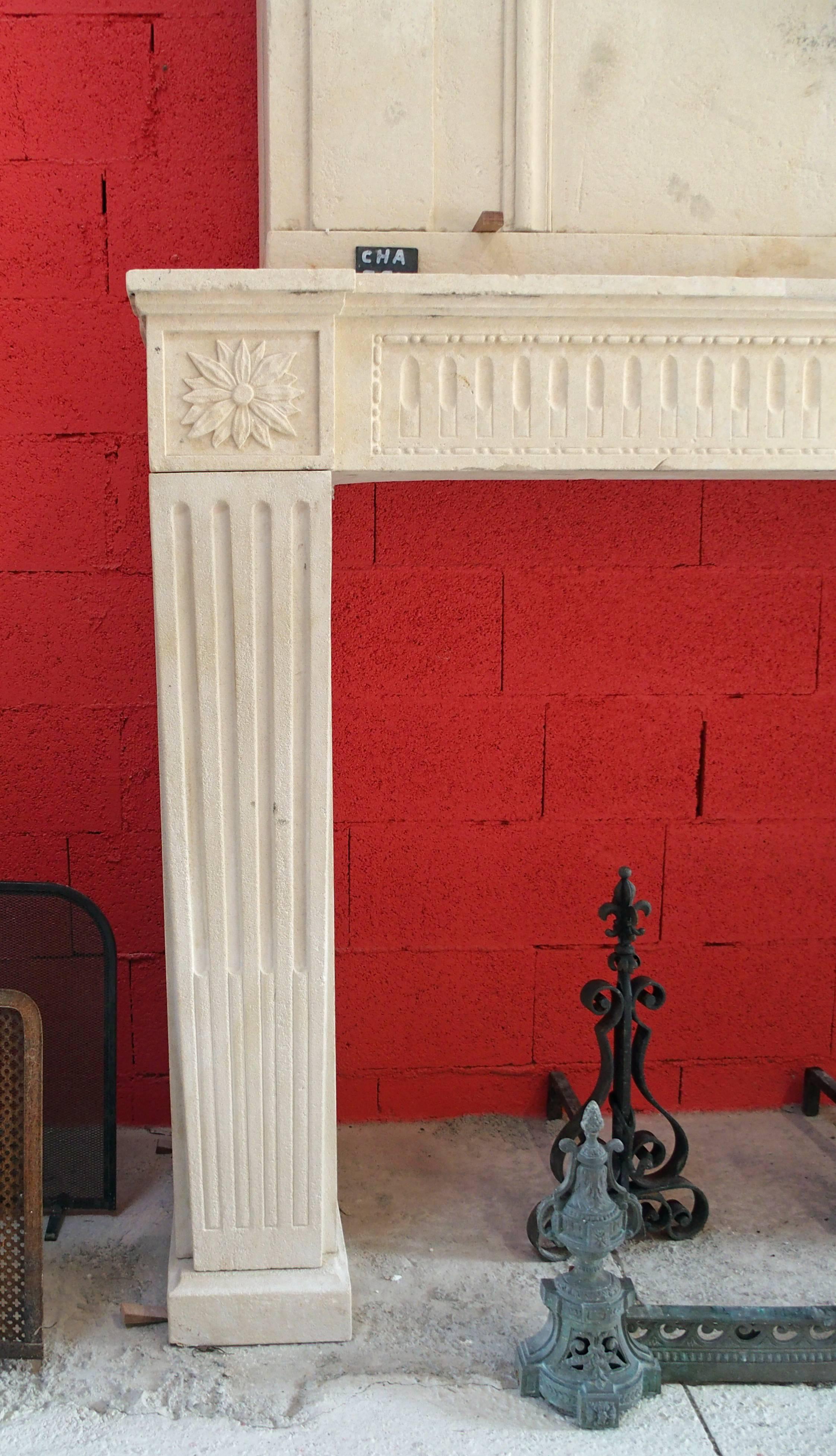 French 18th Century Louis XVI Fireplace with Trumeau Hand-Sculpted in Stone, France For Sale