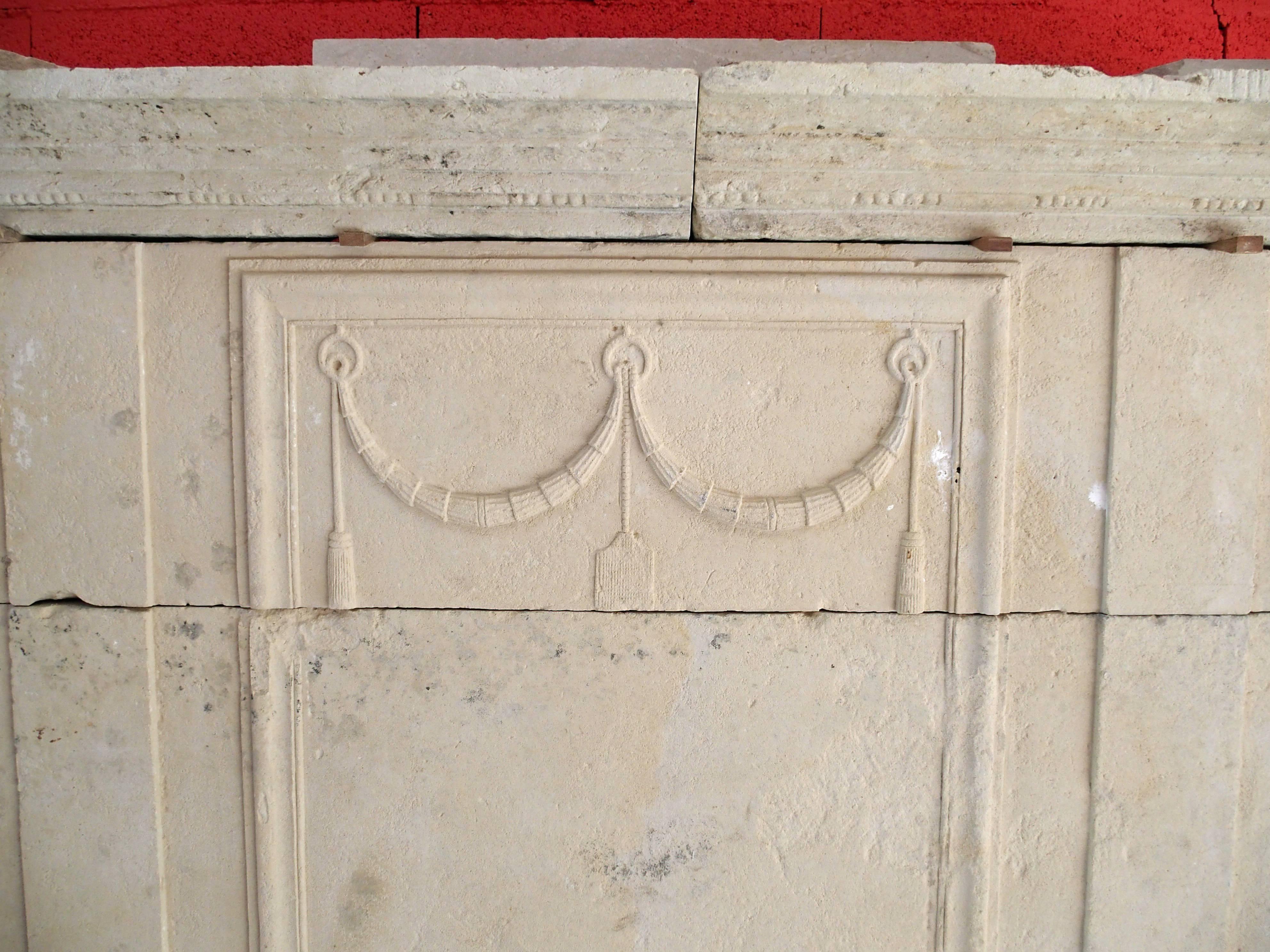 Limestone 18th Century Louis XVI Fireplace with Trumeau Hand-Sculpted in Stone, France For Sale