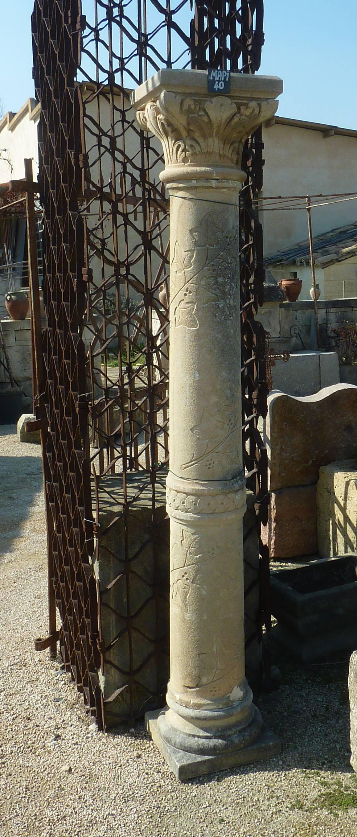 Hand-carved into a quality natural limestone, each column offers a beautiful warm-toned patina and features very finely sculpted details.

These columns sit on square bases. Each one features beautiful bolection style moldings and Fine sculpted