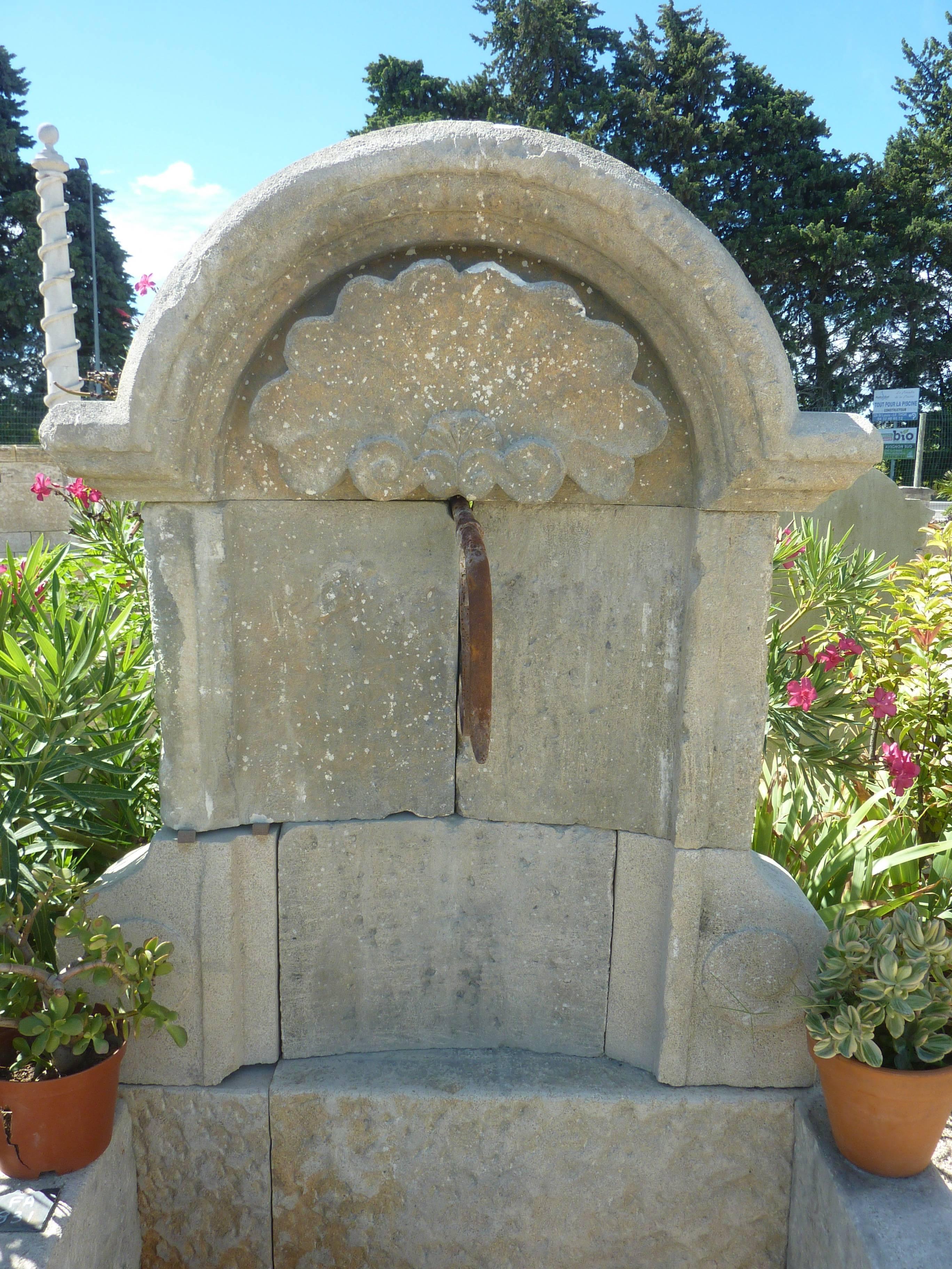 Hand-Carved Ancient French Regence-Style Wall-Fountain Carved in Patinated Stone, Provence For Sale