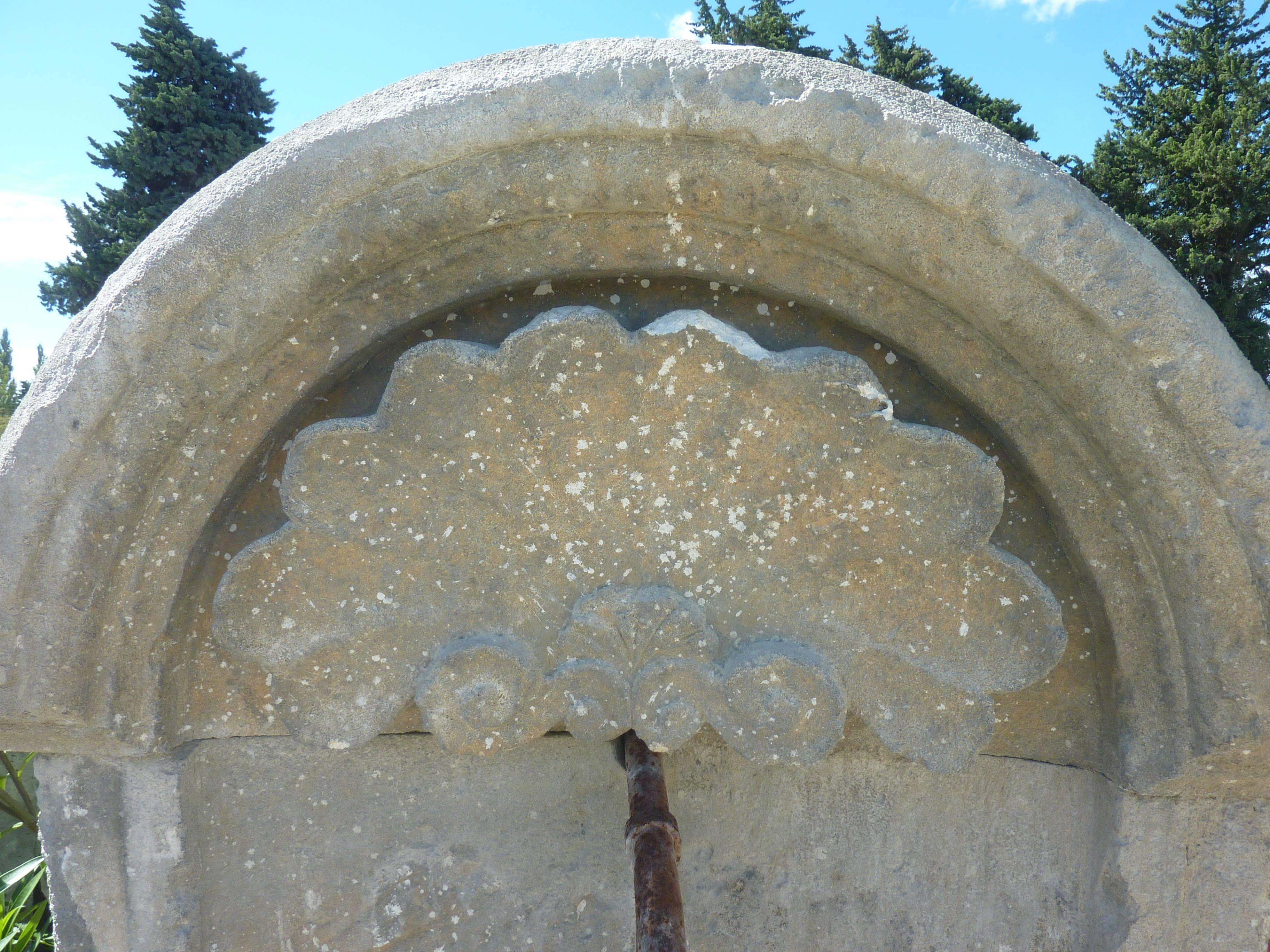 Ancient French Regence-Style Wall-Fountain Carved in Patinated Stone, Provence For Sale 1