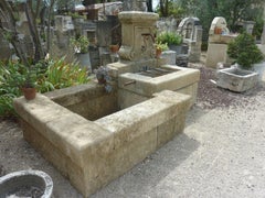 Ancient Ornamental Wall-Fountain Crafted in Stone with Two Basins, Provence