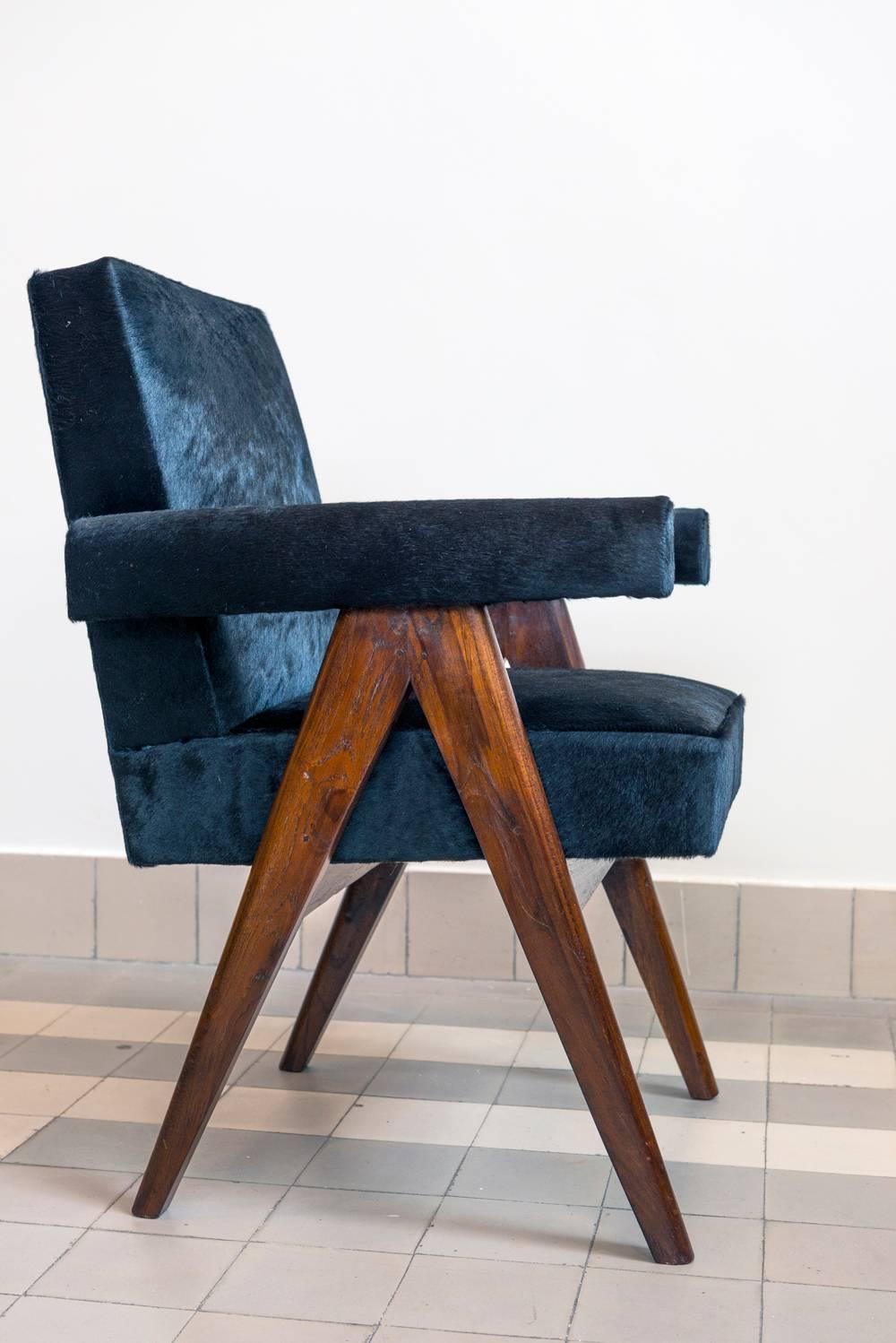 Pierre Jeanneret
PJ-SI-30-A 
Armchair called “Committe armchair”, circa 1953-1954
Solid teakwood, black cow skin.

Bibliography :
Eric Touchaleaume & Gérald Moreau, 