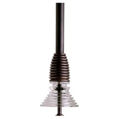 The Insulator 'A' Pendant in dark brass and clear glass by NOVOCASTRIAN deco
